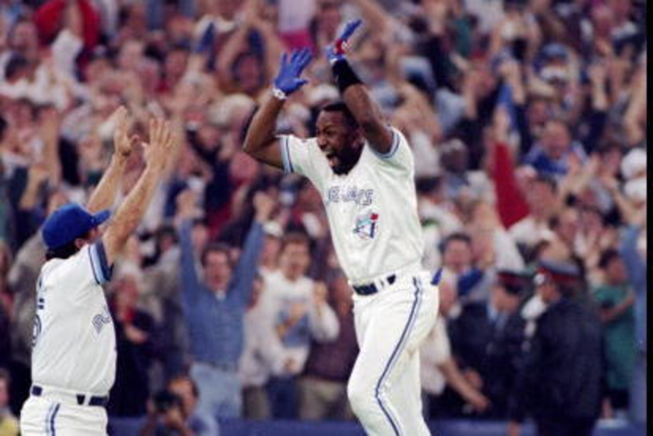 23 Oct 1993:  Firrst baseman Joe Carter of the Toronto Blue Jays celebrates after a home run in the ninth inning during the World Series against the Philadelphia Phillies at the Toronto Sky Dome in Toronto, Canada. Mandatory Credit: Rick Stewart  /Allspor