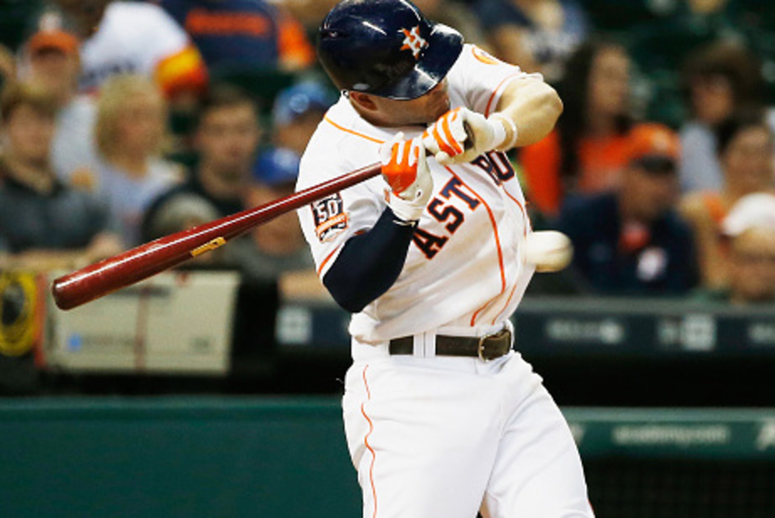 HOUSTON, TX - JULY 01:  Jose Altuve #27 of the Houston Astros gets hit by a pitch against the Kansas City Royals in the seventh inning during their game at Minute Maid Park on July 1, 2015 in Houston, Texas.  (Photo by Scott Halleran/Getty Images)