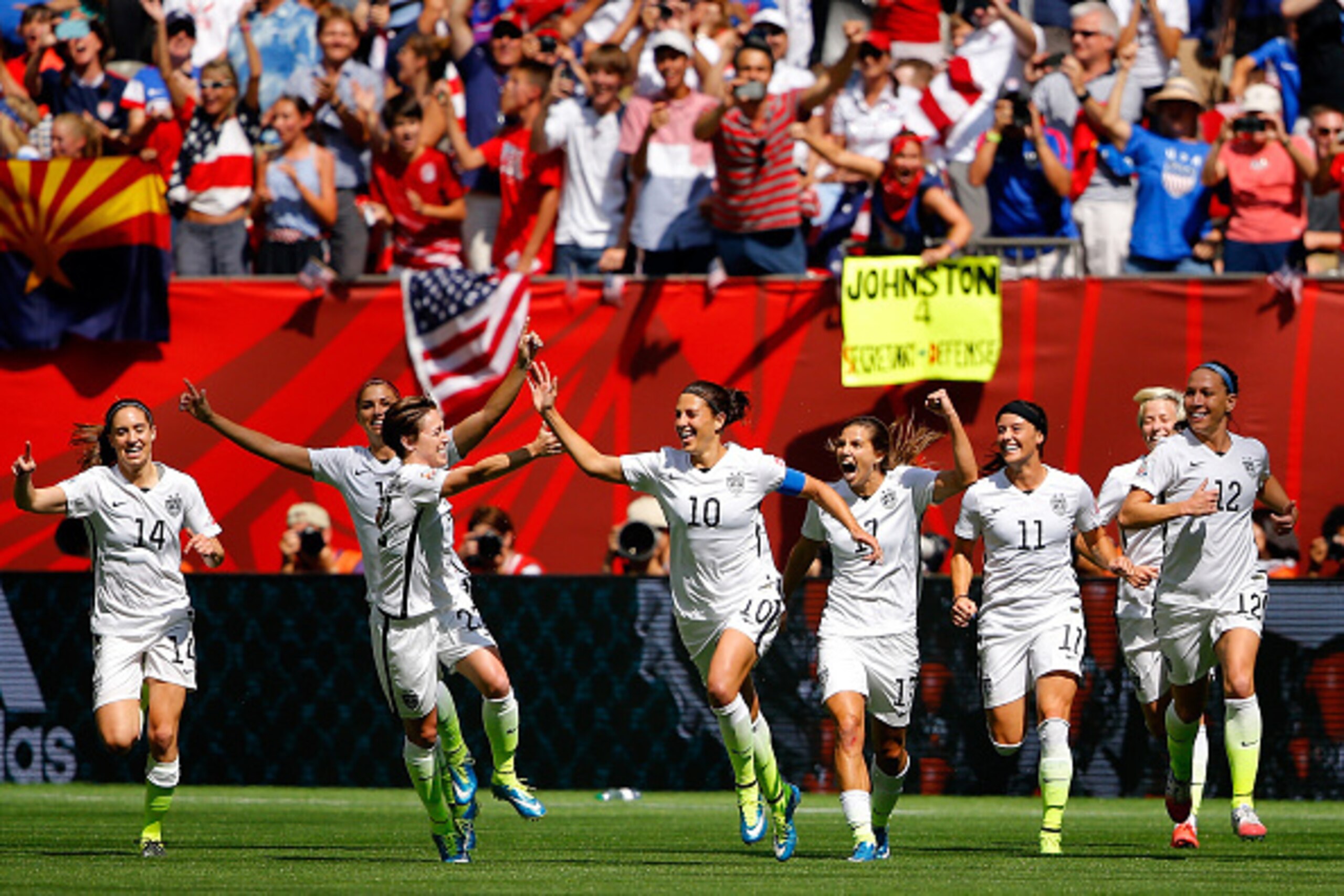 VANCOUVER, BC - JULY 05:  Carli Lloyd #10 of the United States celebrates with teammates after scoring her second goal against Japan in the FIFA Women's World Cup Canada 2015 Final at BC Place Stadium on July 5, 2015 in Vancouver, Canada.  (Photo by Kevin