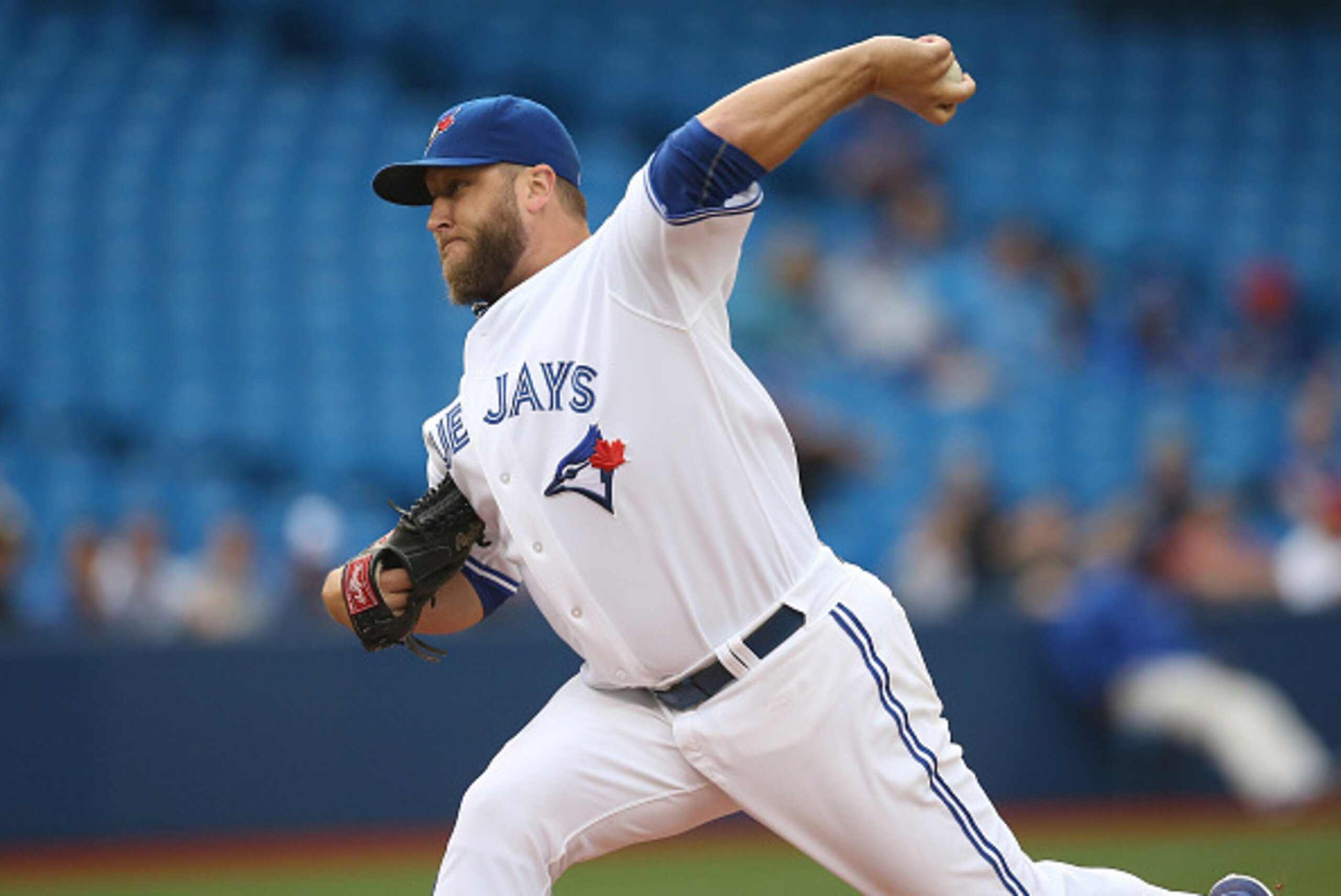 TORONTO, CANADA - JUNE 26: Mark Buehrle #56 of the Toronto Blue Jays delivers a pitch in the first inning during MLB game action against the Texas Rangers on June 26, 2015 at Rogers Centre in Toronto, Ontario, Canada. (Photo by Tom Szczerbowski/Getty Imag