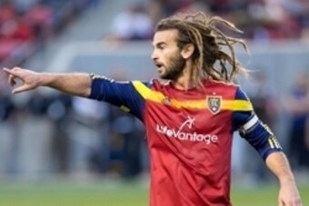 Apr 18, 2015; Sandy, UT, USA; Real Salt Lake midfielder Kyle Beckerman (5) gestures to a teammate during the first half against the Vancouver Whitecaps FC at Rio Tinto Stadium. The Whitecaps won 1-0. Mandatory Credit: Russ Isabella-USA TODAY Sports