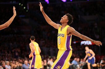 LOS ANGELES, CA - DECEMBER 23:  Nick Young #0 of the Los Angeles Lakers celebrates after making a three point shot against the Golden State Warriors at Staples Center on December 23, 2014 in Los Angeles, California.  NOTE TO USER: User expressly acknowled