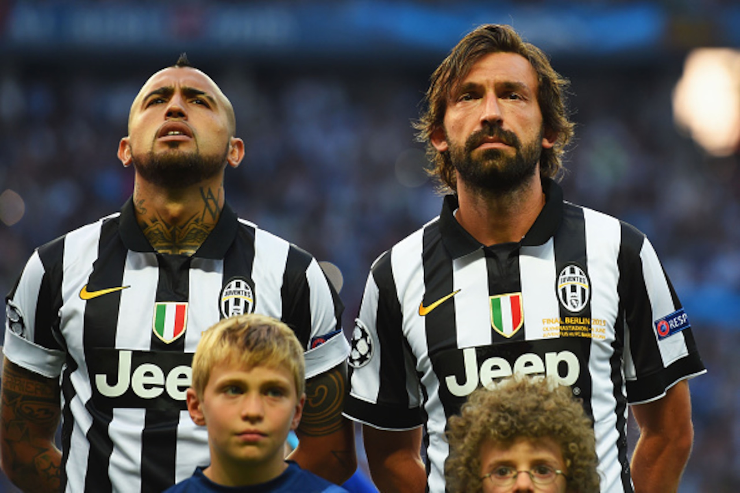 BERLIN, GERMANY - JUNE 06:  Arturo Vidal and Andrea Pirlo of Juventus line up prior to the UEFA Champions League Final between Juventus and FC Barcelona at Olympiastadion on June 6, 2015 in Berlin, Germany.  (Photo by Shaun Botterill/Getty Images)