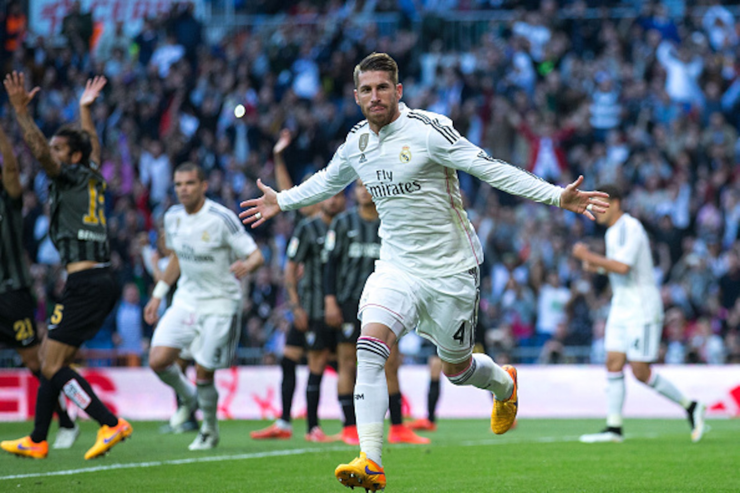 MADRID, SPAIN - APRIL 18: Sergio Ramos of Real Madrid CF celebrates scoring their opening goal during the La Liga match between Real Madrid CF and Malaga CF at Estadio Santiago Bernabeu on April 18, 2015 in Madrid, Spain.  (Photo by Gonzalo Arroyo Moreno/