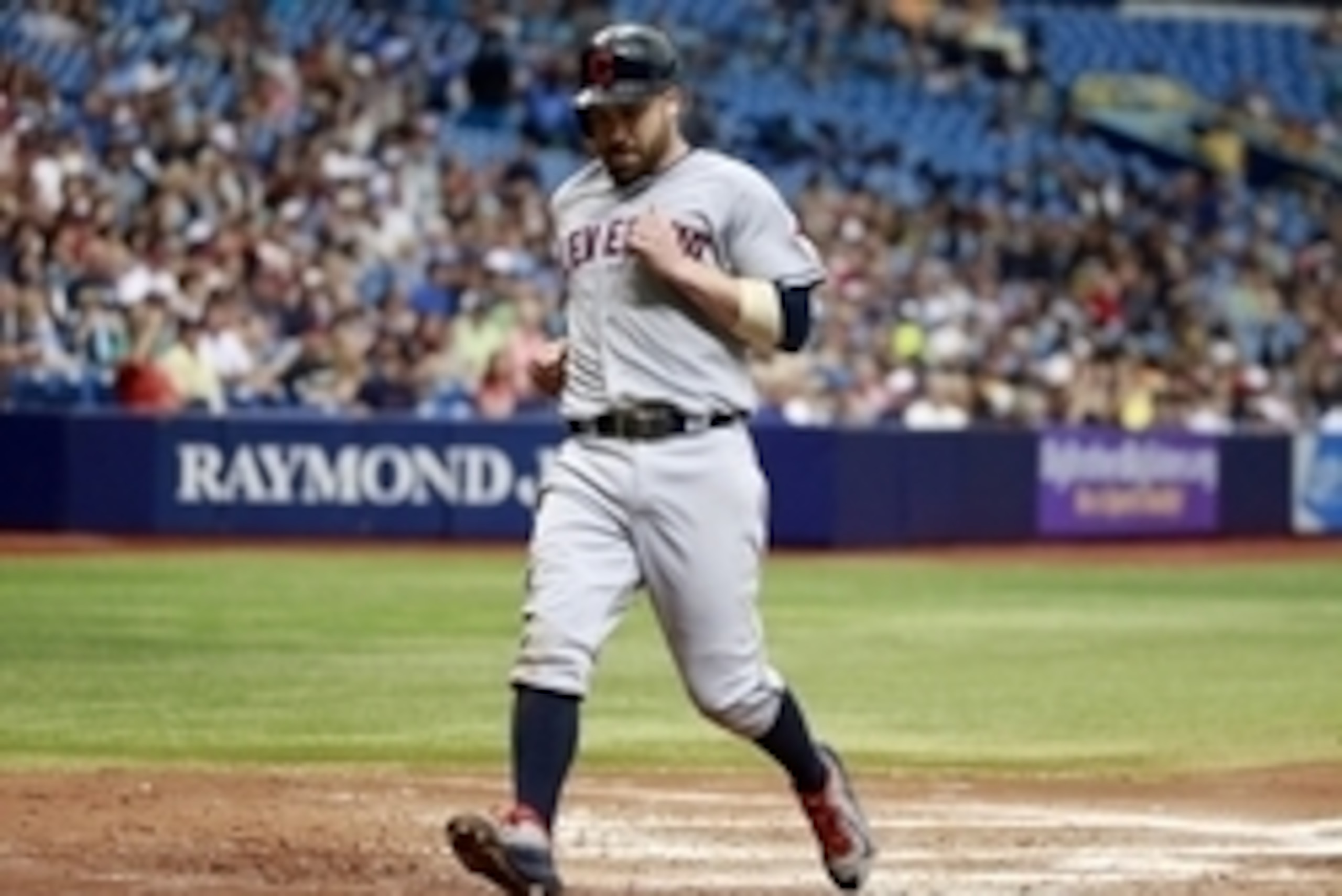 Jul 2, 2015; St. Petersburg, FL, USA; Cleveland Indians second baseman Jason Kipnis (22) scores a run during the fourth inning against the Tampa Bay Rays at Tropicana Field. Mandatory Credit: Kim Klement-USA TODAY Sports