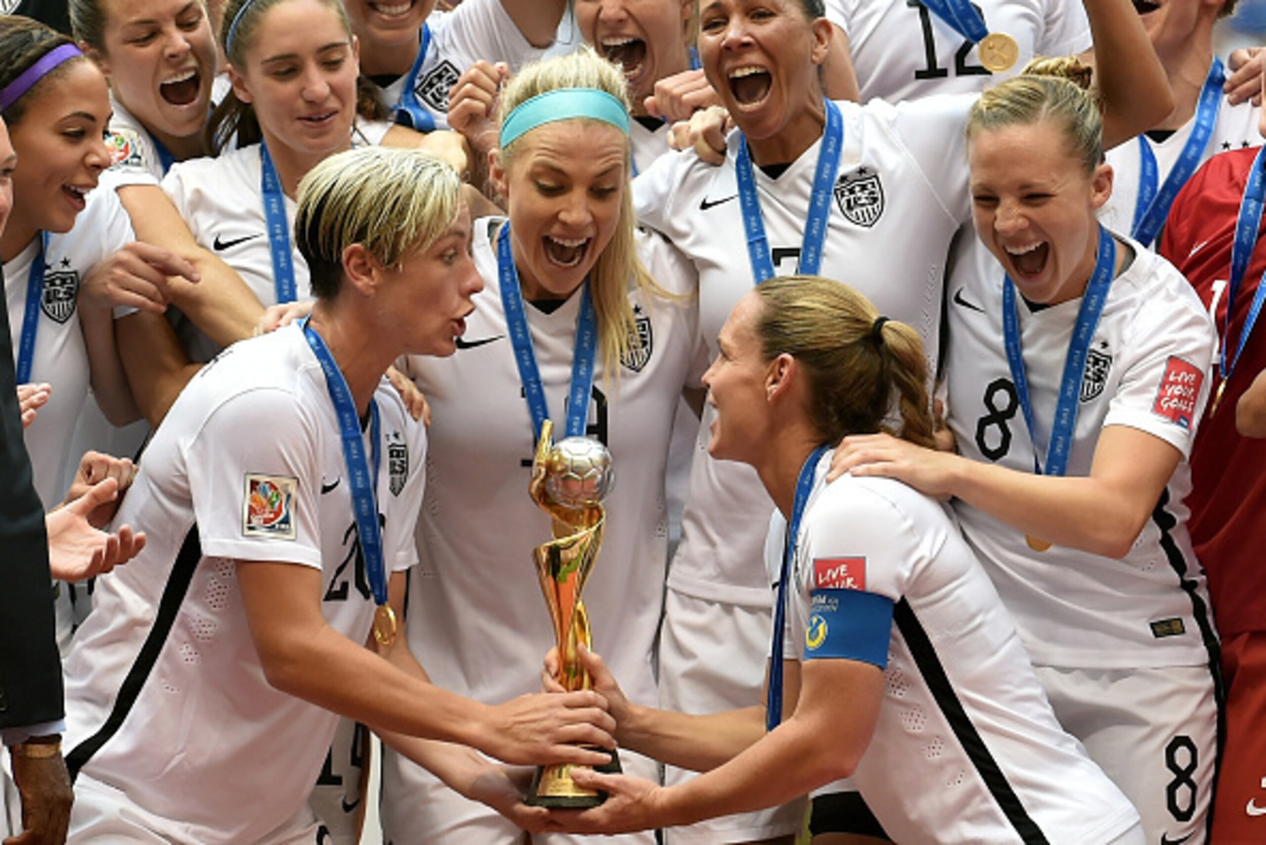 VANCOUVER, BC - JULY 05: Abby Wambach #20 and Christie Rampone #3 of the United States of America hold the World Cup Trophy after their 5-2 win over Japan in the FIFA Women's World Cup Canada 2015 Final at BC Place Stadium on July 5, 2015 in Vancouver, C VANCOUVER, BC - JULY 05: Abby Wambach #20 and Christie Rampone #3 of the United States of America hold the World Cup Trophy after their 5-2 win over Japan in the FIFA Women's World Cup Canada 2015 Final at BC Place Stadium on July 5, 2015 in Vancouver, C