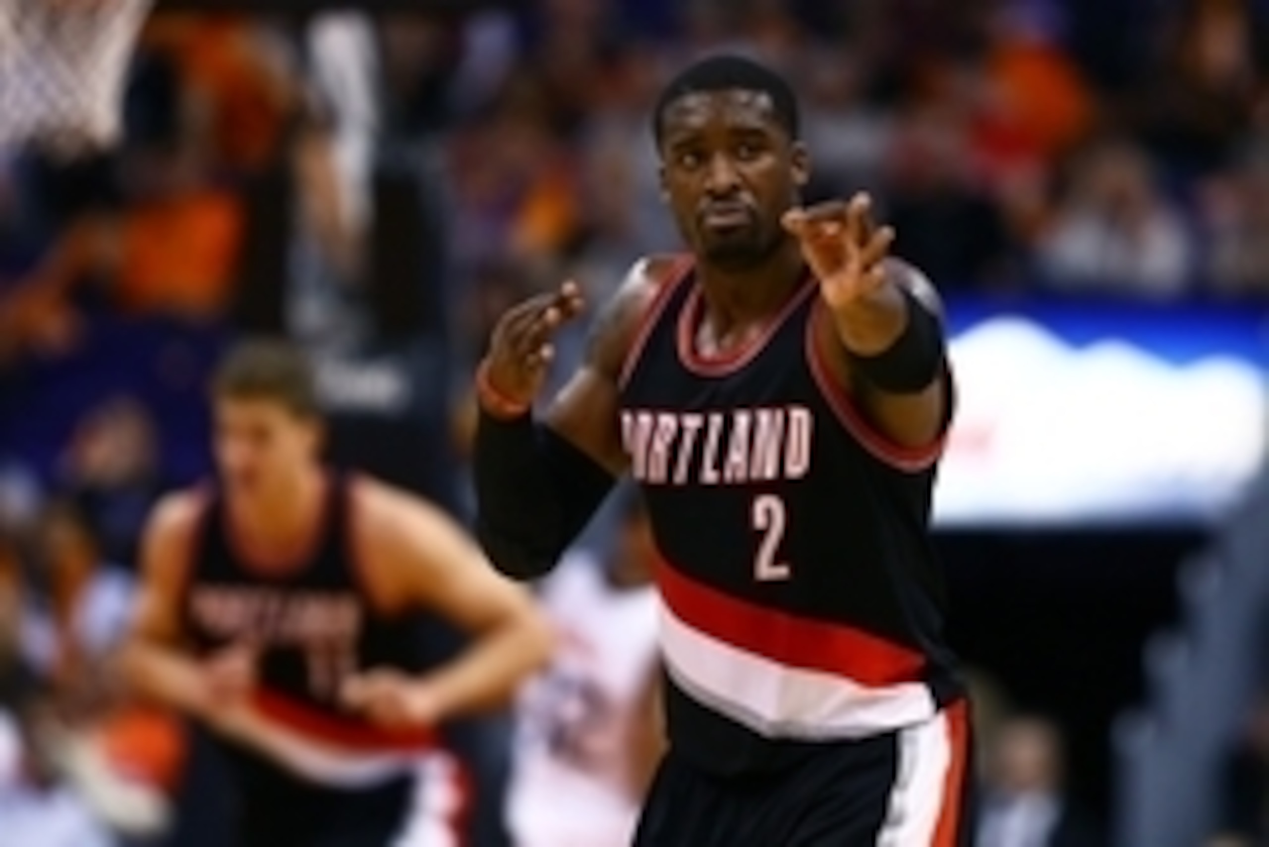 Jan 21, 2015; Phoenix, AZ, USA; Portland Trail Blazers guard Wesley Matthews (2) celebrates a three point shot against the Phoenix Suns at US Airways Center. The Suns defeated the Blazers 118-113. Mandatory Credit: Mark J. Rebilas-USA TODAY Sports
