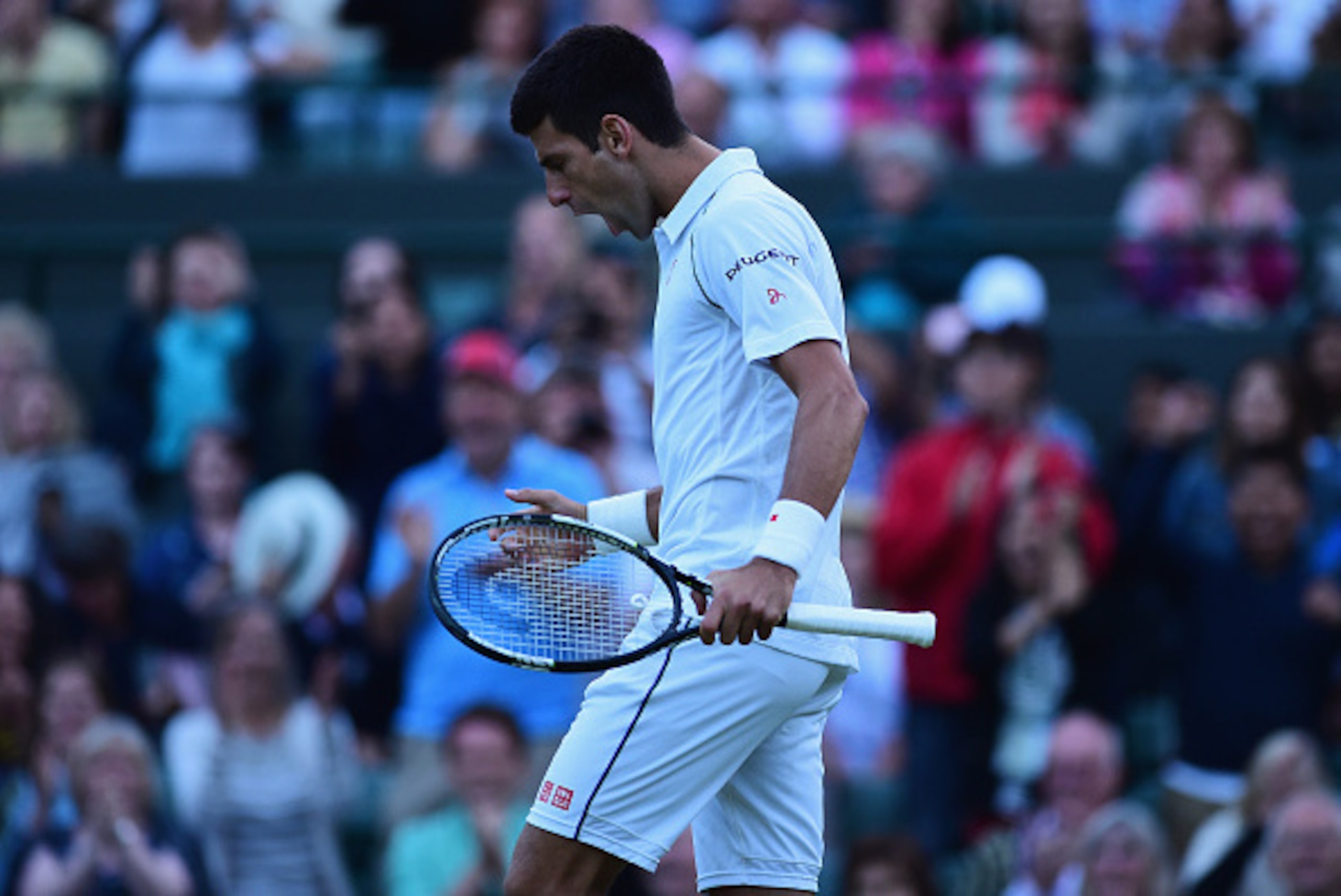 LONDON, ENGLAND - JULY 06: Novak Djokovic of Serbia celebrates the fourth set point in his Gentlemen's Singles Fourth Round match against Kevin Anderson of South Africa during day seven of the Wimbledon Lawn Tennis Championships at the All England Lawn T LONDON, ENGLAND - JULY 06: Novak Djokovic of Serbia celebrates the fourth set point in his Gentlemen's Singles Fourth Round match against Kevin Anderson of South Africa during day seven of the Wimbledon Lawn Tennis Championships at the All England Lawn T