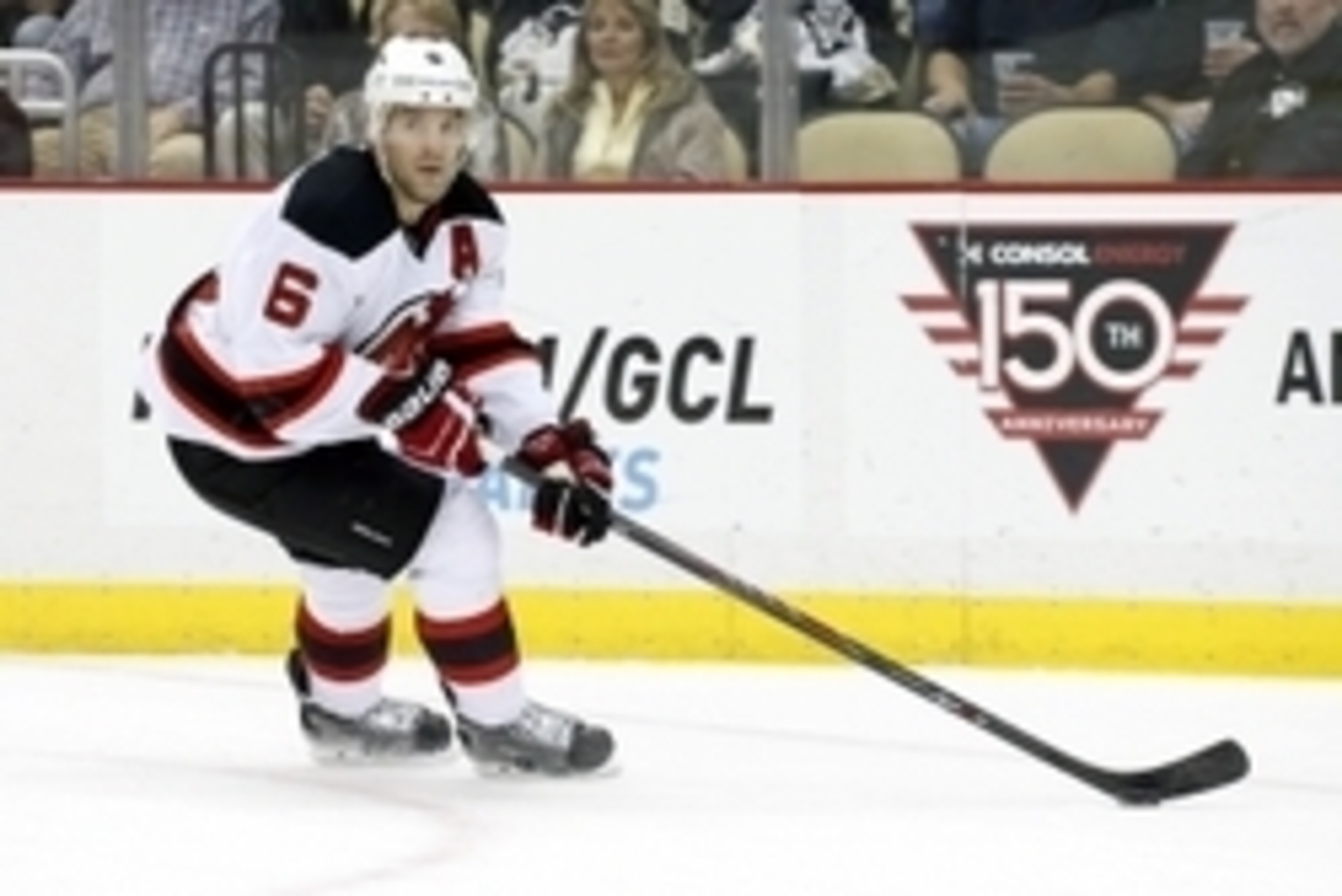 Oct 28, 2014; Pittsburgh, PA, USA; New Jersey Devils defenseman Andy Greene (6) skates with the puck against the Pittsburgh Penguins during the first period at the CONSOL Energy Center. The Penguins won 8-3. Mandatory Credit: Charles LeClaire-USA TODAY Sp
