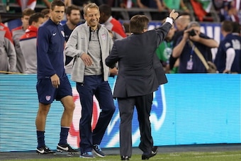 GLENDALE, AZ - APRIL 02:  Head coaches Jurgen Klinsmann of USA and Miguel Herrera of Mexico shake hands following the International Friendly at University of Phoenix Stadium on April 2, 2014 in Glendale, Arizona. Mexico and USA played to a 2-2 tie. (Photo