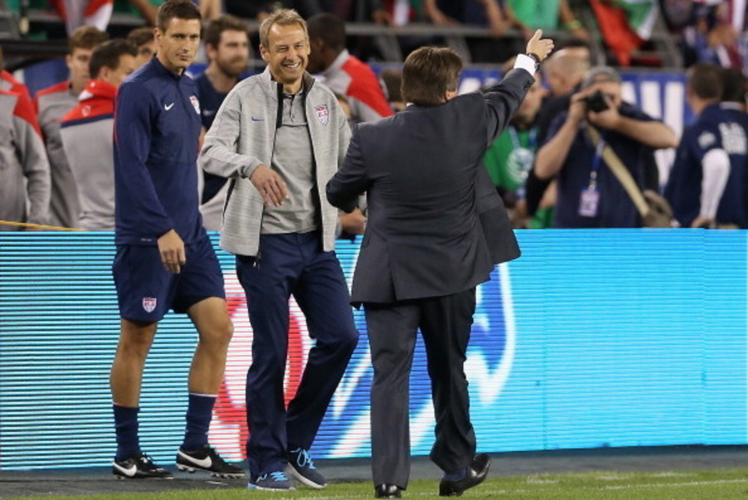 GLENDALE, AZ - APRIL 02:  Head coaches Jurgen Klinsmann of USA and Miguel Herrera of Mexico shake hands following the International Friendly at University of Phoenix Stadium on April 2, 2014 in Glendale, Arizona. Mexico and USA played to a 2-2 tie. (Photo
