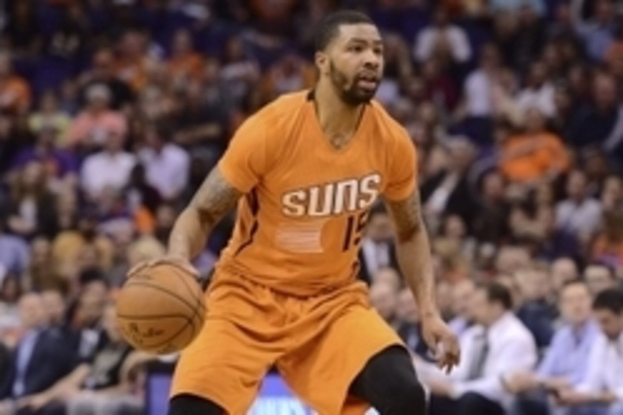 Feb 6, 2015; Phoenix, AZ, USA; Phoenix Suns forward Marcus Morris (15) dribbles against the Utah Jazz during the second half at US Airways Center. The Suns won 100-93 Mandatory Credit: Joe Camporeale-USA TODAY Sports