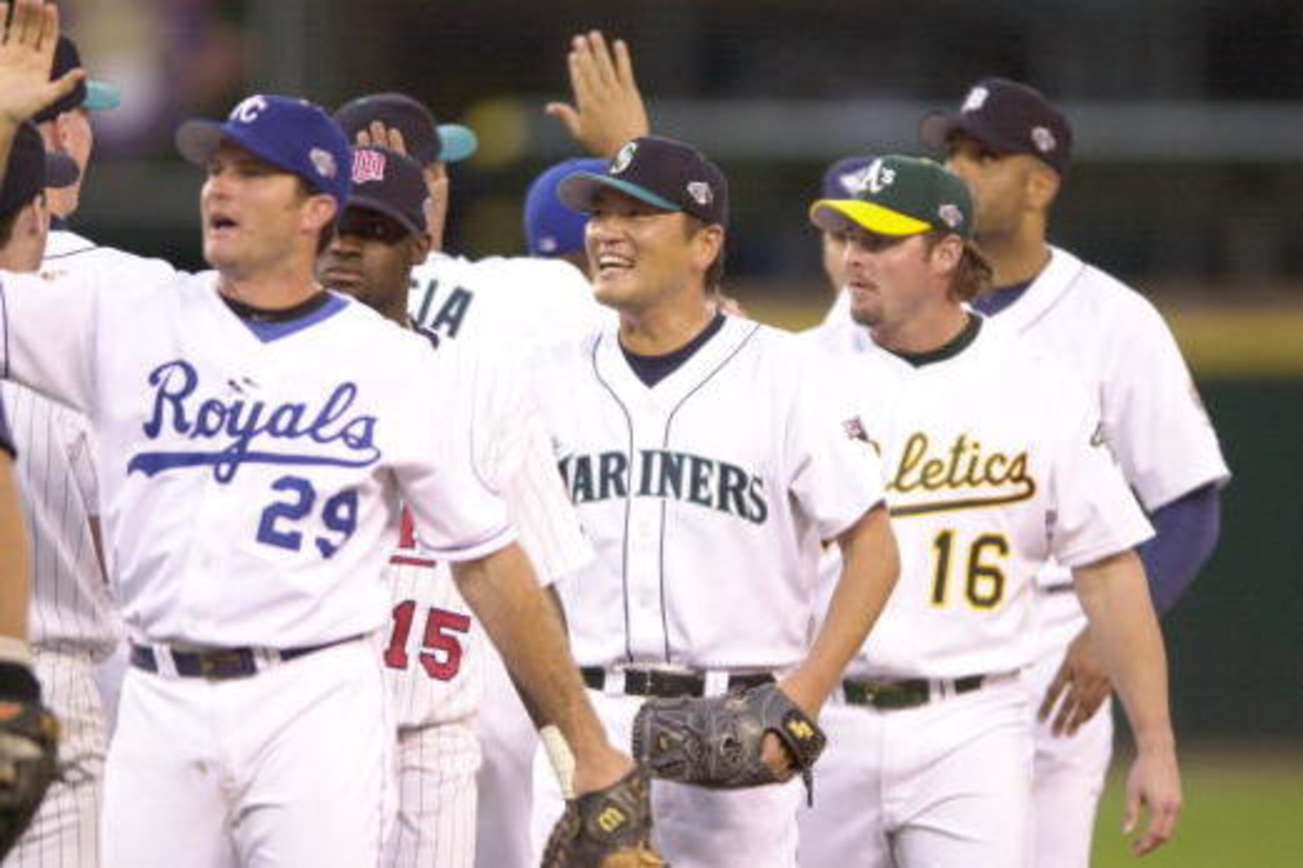 10 Jul 2001:  Kazuhiro Sasaki of the Seattle Mariners celebrates with teammates, including Mike Sweeney #29 of the Kansas City Royals and Jason Giambi #16 of the Oakland Athletics, after the final out of the 2001 Major League Baseball All-Star Game at Saf
