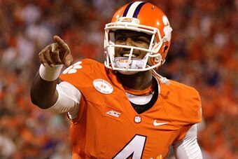 CLEMSON, SC - SEPTEMBER 27: Deshaun Watson #4 of the Clemson Tigers points to the crowd after setting the single game record for touchdown passes in the fourth quarter of the game against the North Carolina Tar Heels at Memorial Stadium on September 27, 2