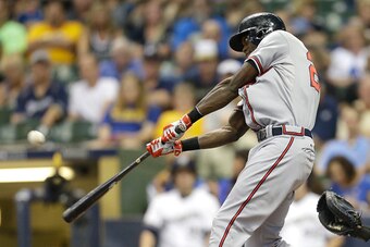MILWAUKEE, WI - JULY 06: Cameron Maybin #25 of the Atlanta Braves hits a single during the first inning against the Milwaukee Brewers at Miller Park on July 06, 2015 in Milwaukee, Wisconsin. (Photo by Mike McGinnis/Getty Images)