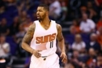 Mar 22, 2015; Phoenix, AZ, USA; Phoenix Suns forward Markieff Morris (11) against the Dallas Mavericks at US Airways Center. The Suns defeated the Mavericks 98-92. Mandatory Credit: Mark J. Rebilas-USA TODAY Sports