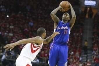 May 6, 2015; Houston, TX, USA; Los Angeles Clippers guard Jamal Crawford (11) shoots the ball during the third quarter as Houston Rockets forward Trevor Ariza (1) defends in game two of the second round of the NBA Playoffs at Toyota Center. Mandatory Cred