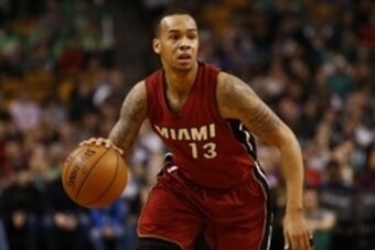 Feb 1, 2015; Boston, MA, USA; Miami Heat guard Shabazz Napier (13) dribbles the ball against the Boston Celtics during the first half at TD Garden. Mandatory Credit: Mark L. Baer-USA TODAY Sports