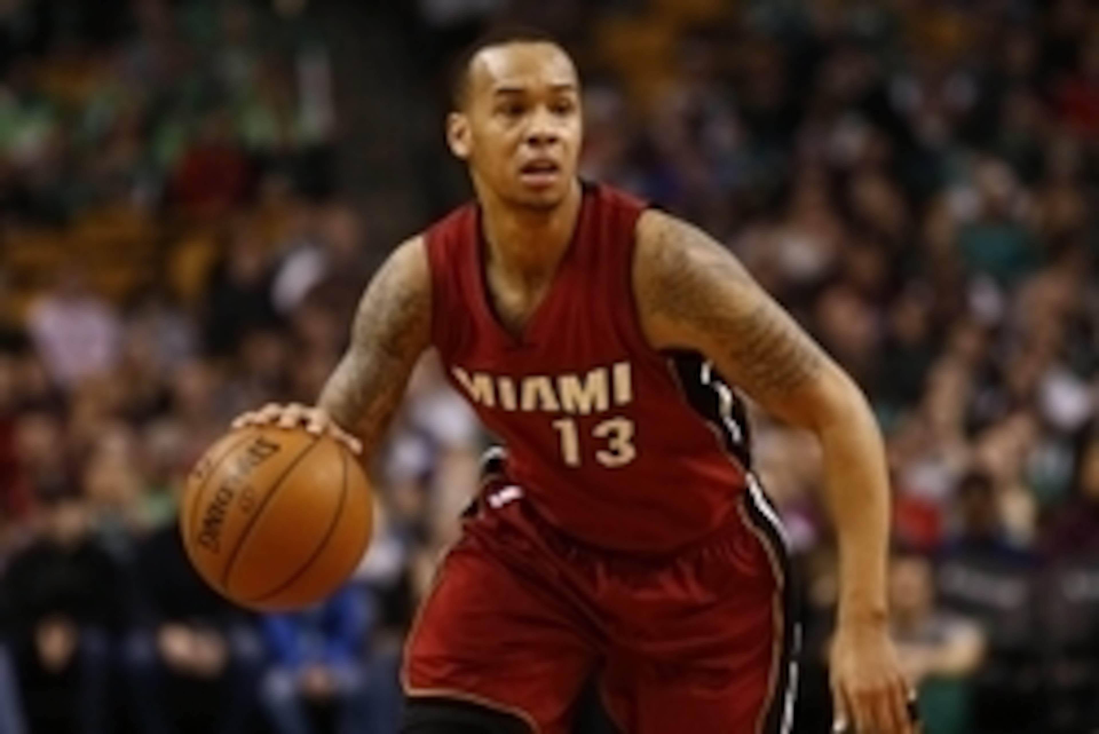 Feb 1, 2015; Boston, MA, USA; Miami Heat guard Shabazz Napier (13) dribbles the ball against the Boston Celtics during the first half at TD Garden. Mandatory Credit: Mark L. Baer-USA TODAY Sports
