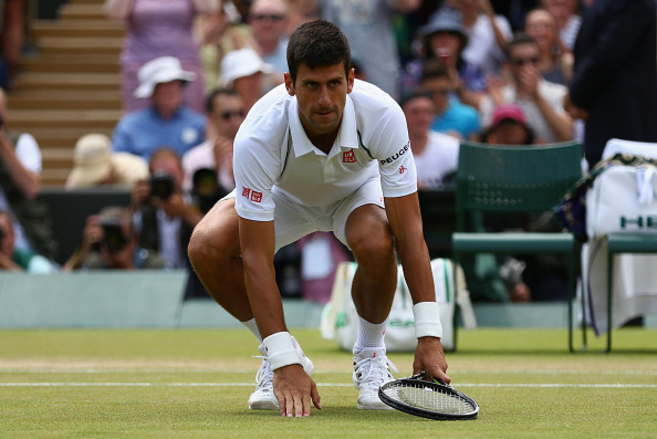 LONDON, ENGLAND - JULY 07:  Novak Djokovic of Serbia celebrates after winning his Gentlemens Singles Fourth Round match against Kevin Anderson of South Africa during day eight of the Wimbledon Lawn Tennis Championships at the All England Lawn Tennis and C