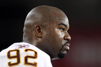 GLENDALE, AZ - SEPTEMBER 02:  Defensive tackle Albert Haynesworth #92 of the Washington Redskins stands on the sidelines during preseason NFL game against the Arizona Cardinals at the University of Phoenix Stadium on September 2, 2010 in Glendale, Arizona
