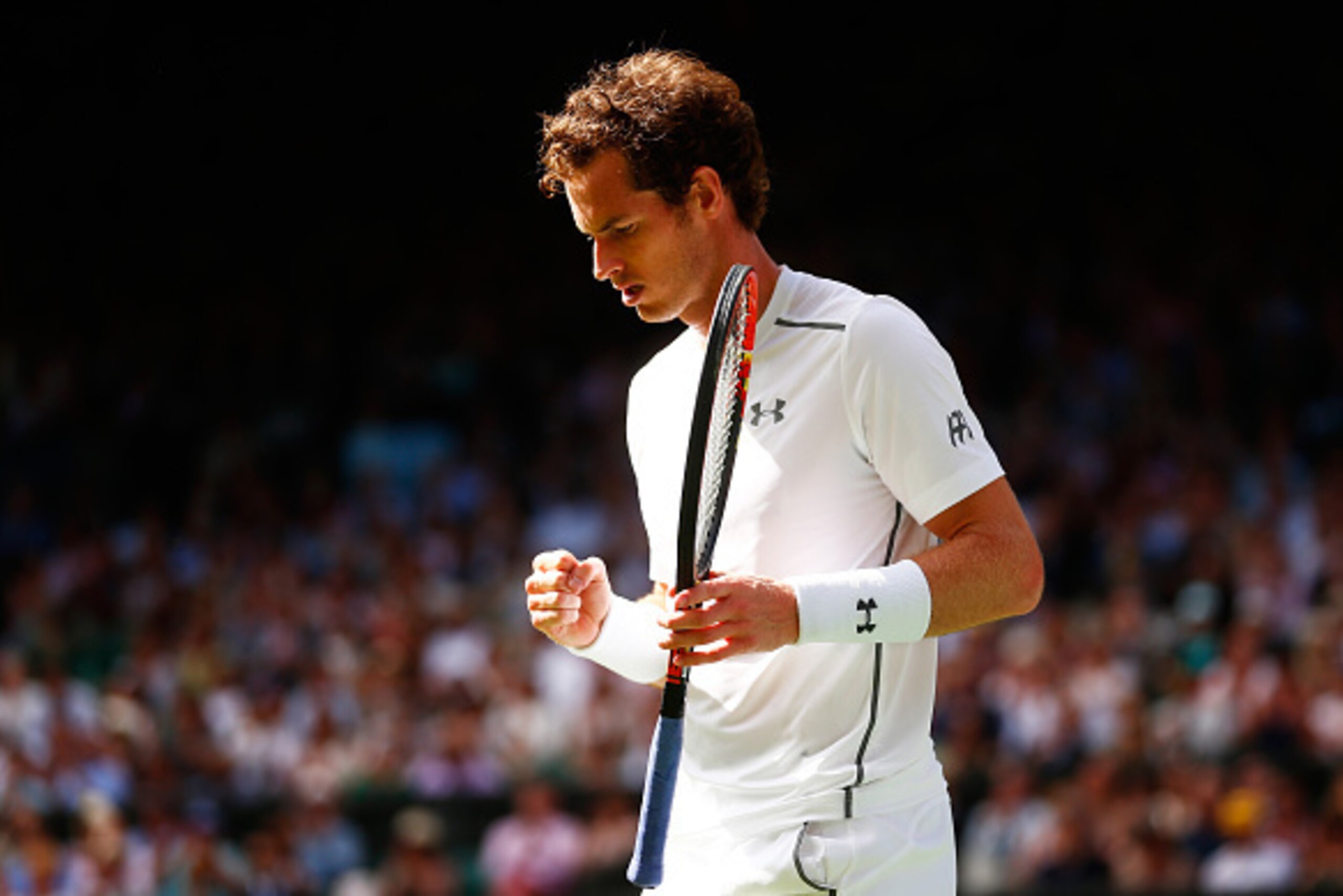 LONDON, ENGLAND - JULY 06:  Andy Murray of Great Britain celebrates a point in his Gentlemen's Singles Fourth Round match against Ivo Karlovic of Croatia during day seven of the Wimbledon Lawn Tennis Championships at the All England Lawn Tennis and Croque
