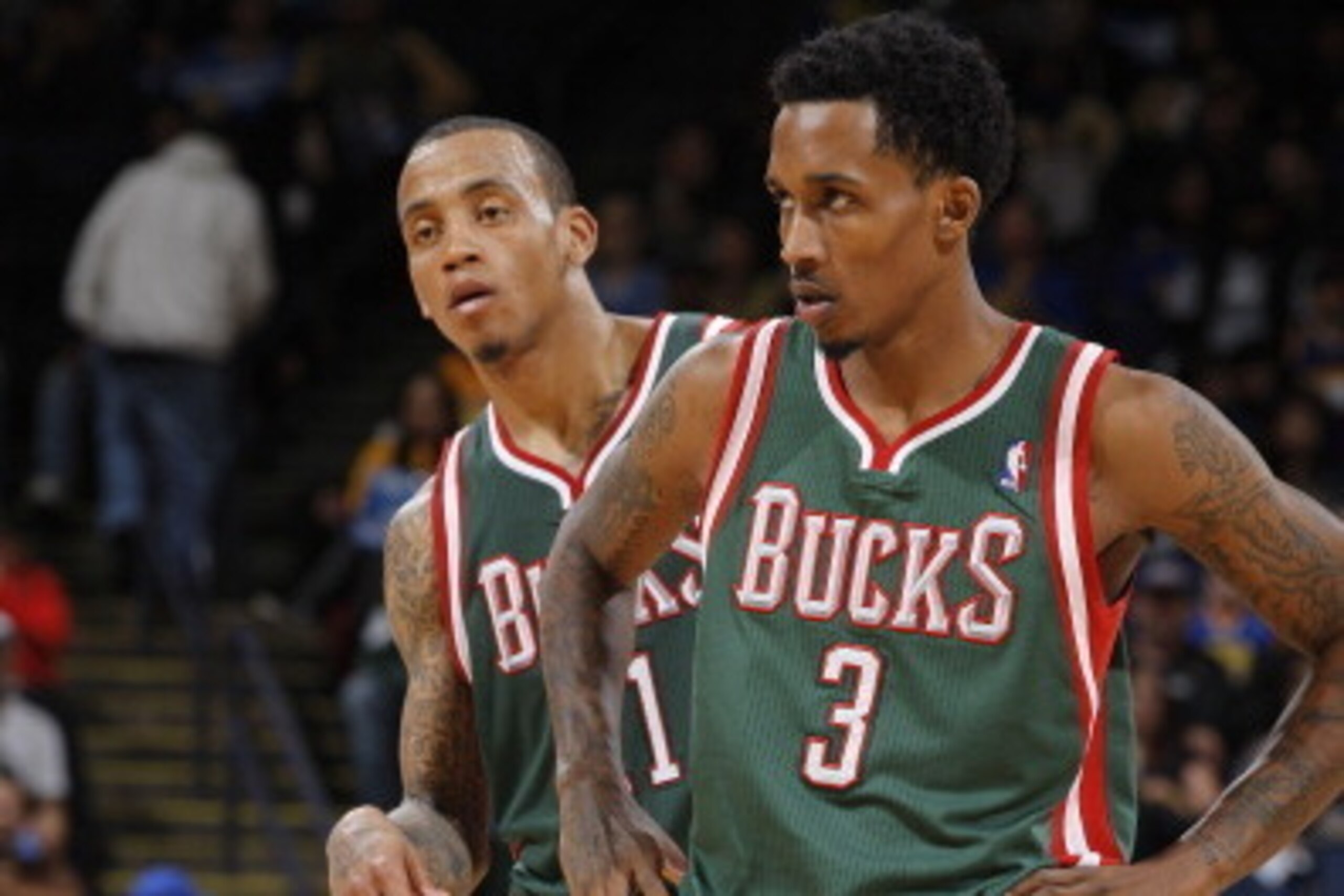 OAKLAND, CA - MARCH 16: Teammates Monta Ellis #11 and Brandon Jennings #3 of the Milwaukee Bucks check into the game against the Golden State Warriors on March 16, 2012 at Oracle Arena in Oakland, California. NOTE TO USER: User expressly acknowledges and OAKLAND, CA - MARCH 16: Teammates Monta Ellis #11 and Brandon Jennings #3 of the Milwaukee Bucks check into the game against the Golden State Warriors on March 16, 2012 at Oracle Arena in Oakland, California. NOTE TO USER: User expressly acknowledges and