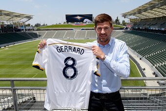 CARSON, CA - JULY 7: New Los Angeles Galaxy midfielder Steven Gerrard #8 poses with his jersey after a news conference on July 7, 2015 at StubHub Center in Carson, California. The former Liverpool captain Steven Gerrard is scheduled to play his first MLS 