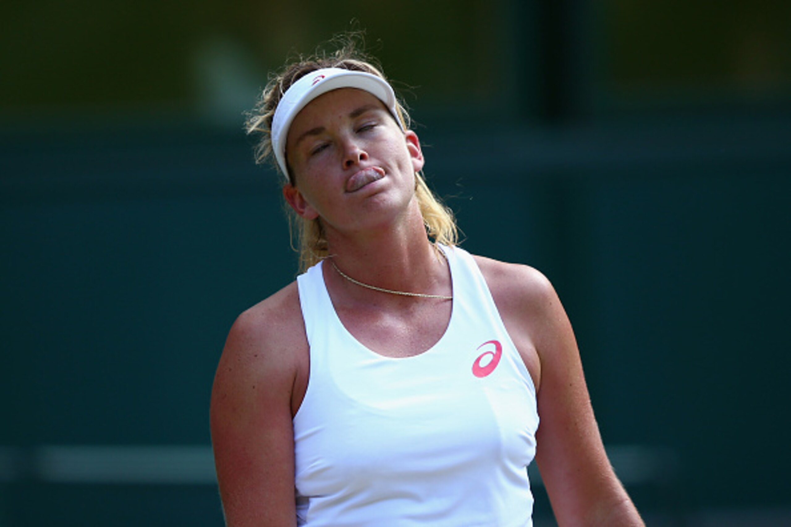 LONDON, ENGLAND - JULY 07:  Coco Vandeweghe of the United States reacts in her Ladies Singles Quarter Final match against Maria Sharapova of Russia during day eight of the Wimbledon Lawn Tennis Championships at the All England Lawn Tennis and Croquet Club