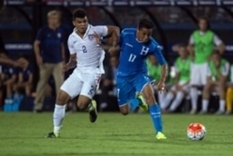 Jul 7, 2015; Dallas, TX, USA; United States defender DeAndre Yedlin (2) and Honduras midfielder Andy Najar (17) fight for the ball during the first half of the 2015 Gold Cup soccer match at Toyota Stadium. Mandatory Credit: Jerome Miron-USA TODAY Sports
