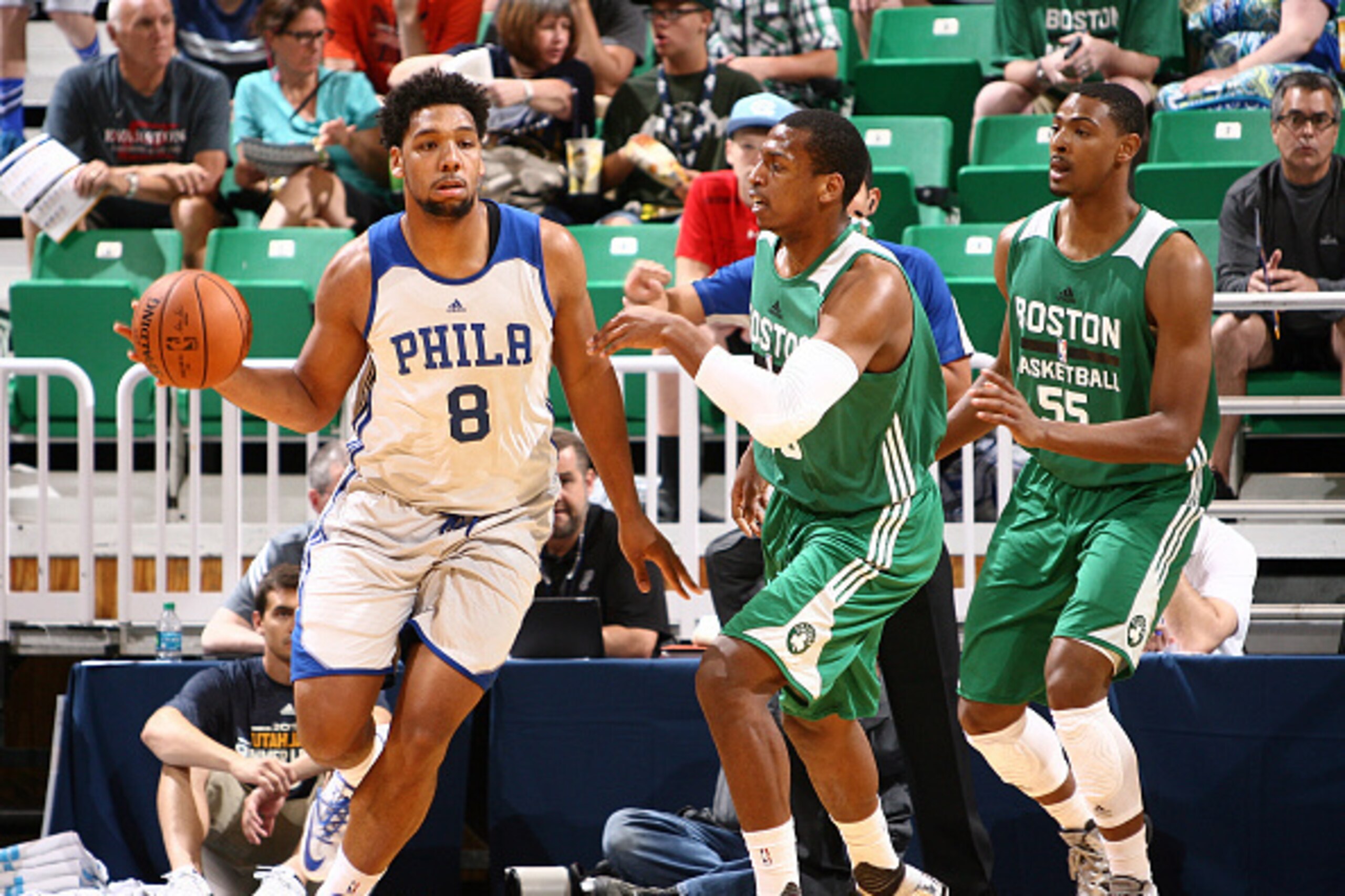 SALT LAKE CITY, UT - JULY 7: Jahlil Okafor #8 of the Philadelphia 76ers handles the ball against Jonathan Holmes #68 of the Boston Celtics during the NBA Summer League on July 6, 2015 at EnergySolutions Arena in Salt Lake City, Utah. USER: User expressly 