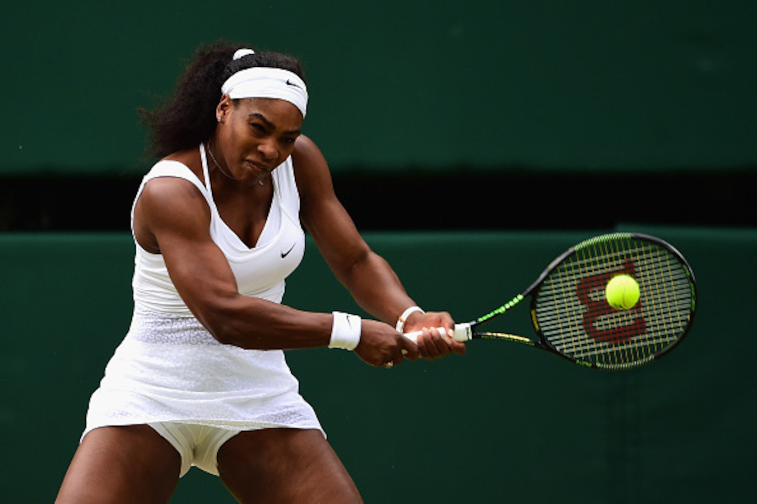 LONDON, ENGLAND - JULY 07: Serena Williams of the United States plays a forehand in her Ladies Singles Quarter Final match against Victoria Azarenka of Belarus during day eight of the Wimbledon Lawn Tennis Championships at the All England Lawn Tennis and LONDON, ENGLAND - JULY 07: Serena Williams of the United States plays a forehand in her Ladies Singles Quarter Final match against Victoria Azarenka of Belarus during day eight of the Wimbledon Lawn Tennis Championships at the All England Lawn Tennis and