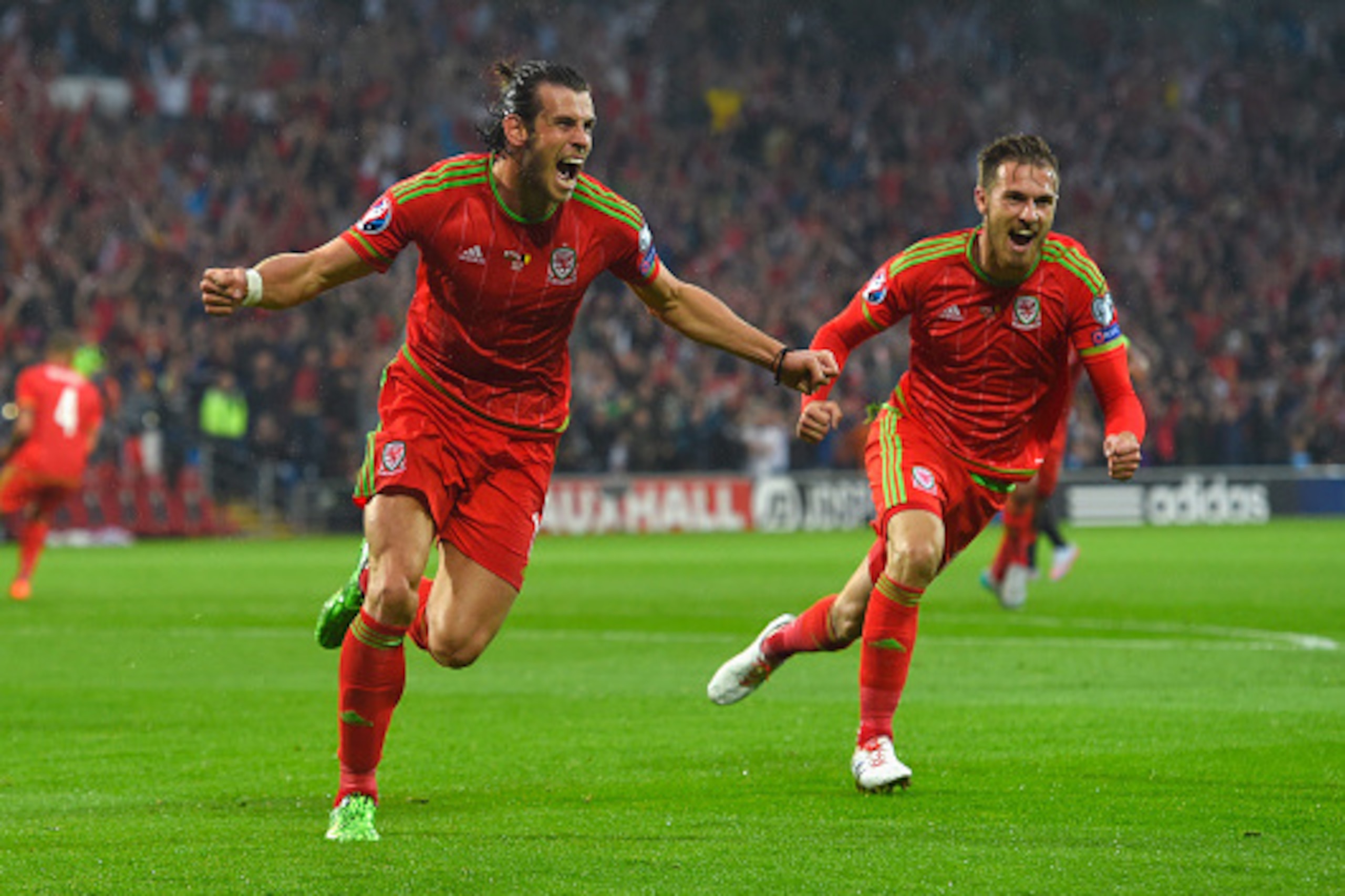 CARDIFF, WALES - JUNE 12:  Wales player Gareth Bale celebrates after scoring the opening goal during the UEFA EURO Group B 2016 Qualifier between Wales and Belguim at Cardiff City stadium on June 12, 2015 in Cardiff, United Kingdom.  (Photo by Stu Forster