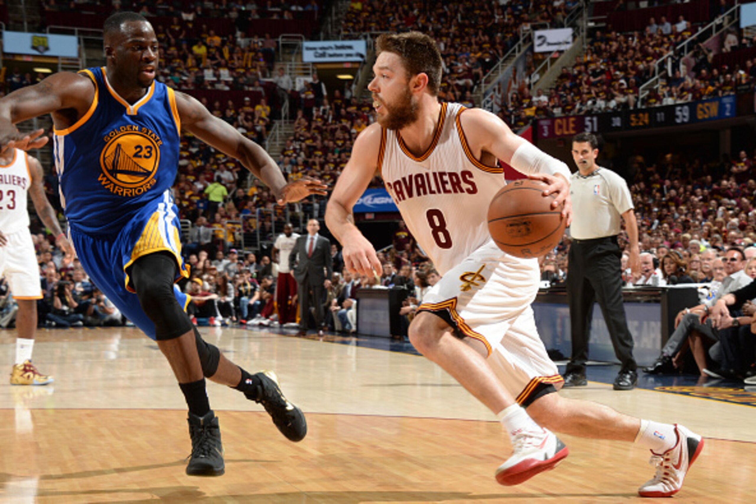 CLEVELAND, OH - JUNE 16: Matthew Dellavedova #8 of the Cleveland Cavaliers drives to the basket during Game Six of the 2015 NBA Finals at The Quicken Loans Arena on June 16, 2015 in Cleveland, Ohio. NOTE TO USER: User expressly acknowledges and agrees tha CLEVELAND, OH - JUNE 16: Matthew Dellavedova #8 of the Cleveland Cavaliers drives to the basket during Game Six of the 2015 NBA Finals at The Quicken Loans Arena on June 16, 2015 in Cleveland, Ohio. NOTE TO USER: User expressly acknowledges and agrees tha