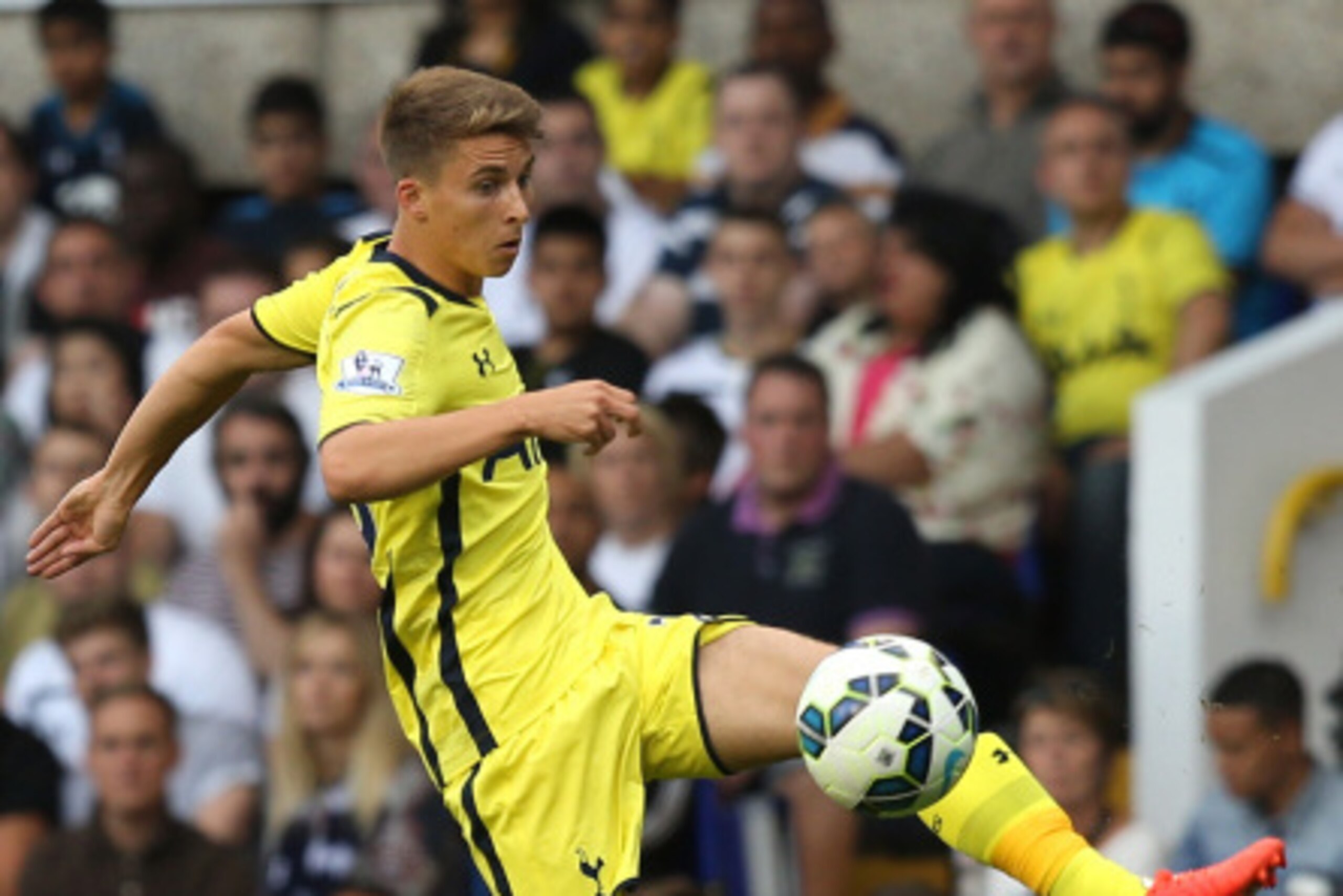 LONDON, ENGLAND - AUGUST 09:  Tom Carroll of Spurs controls the ball during a pre season friendly match between Tottenham Hotspur and FC Schalke at White Hart Lane on August 9, 2014 in London, England.  (Photo by Jan Kruger/Getty Images)