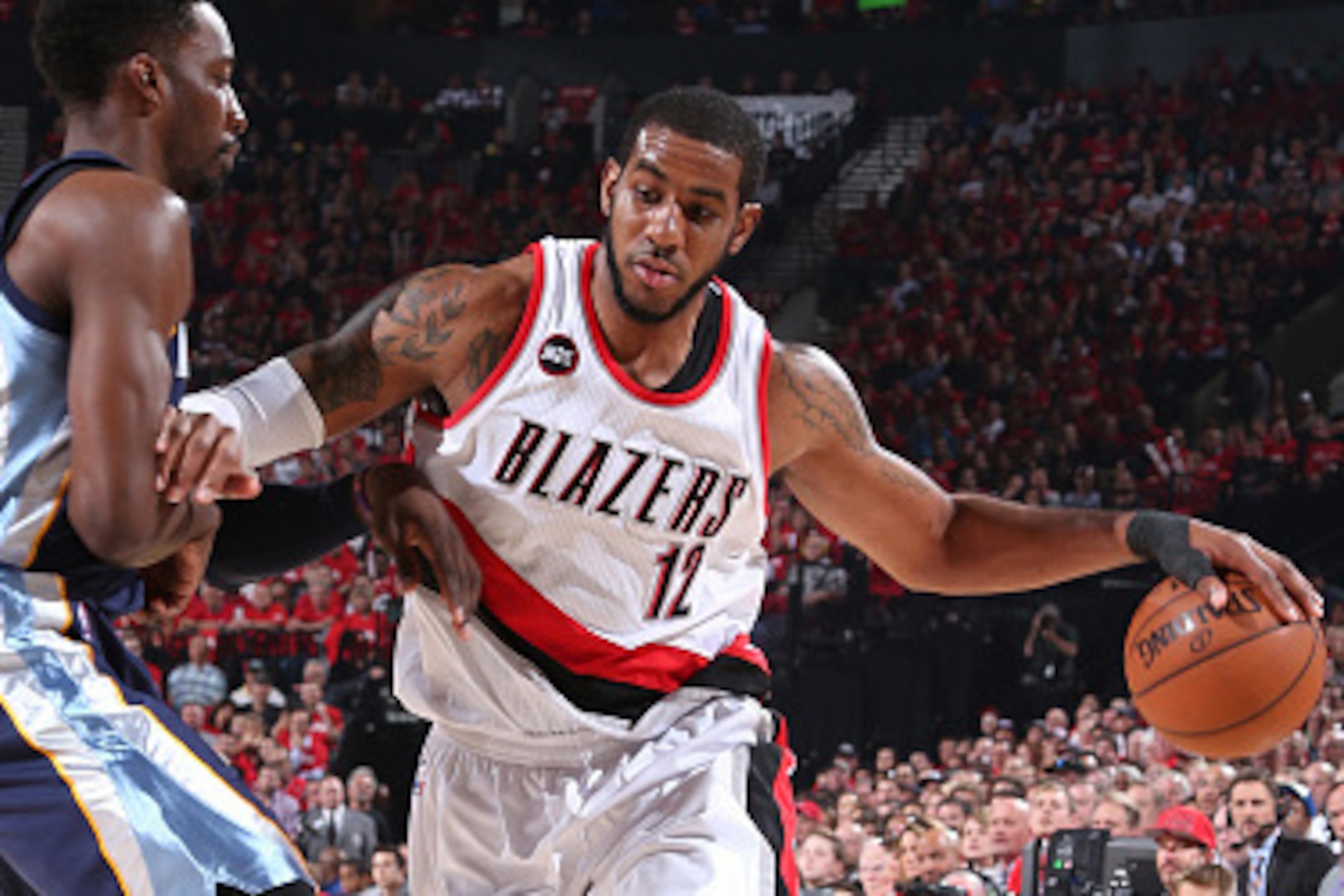 PORTLAND, OR - APRIL 27:  LaMarcus Aldridge #12 of the Portland Trail Blazers drives to the basket against the Memphis Grizzlies in Game Four of the Western Conference Quarterfinals during the 2015 NBA Playoffs on April 27, 2015 at the Moda Center in Port