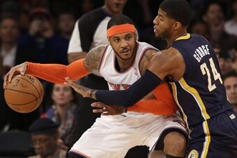 Carmelo Anthony was courted by the Rockets and Bulls last summer but chose to remain with the rebuilding Knicks.