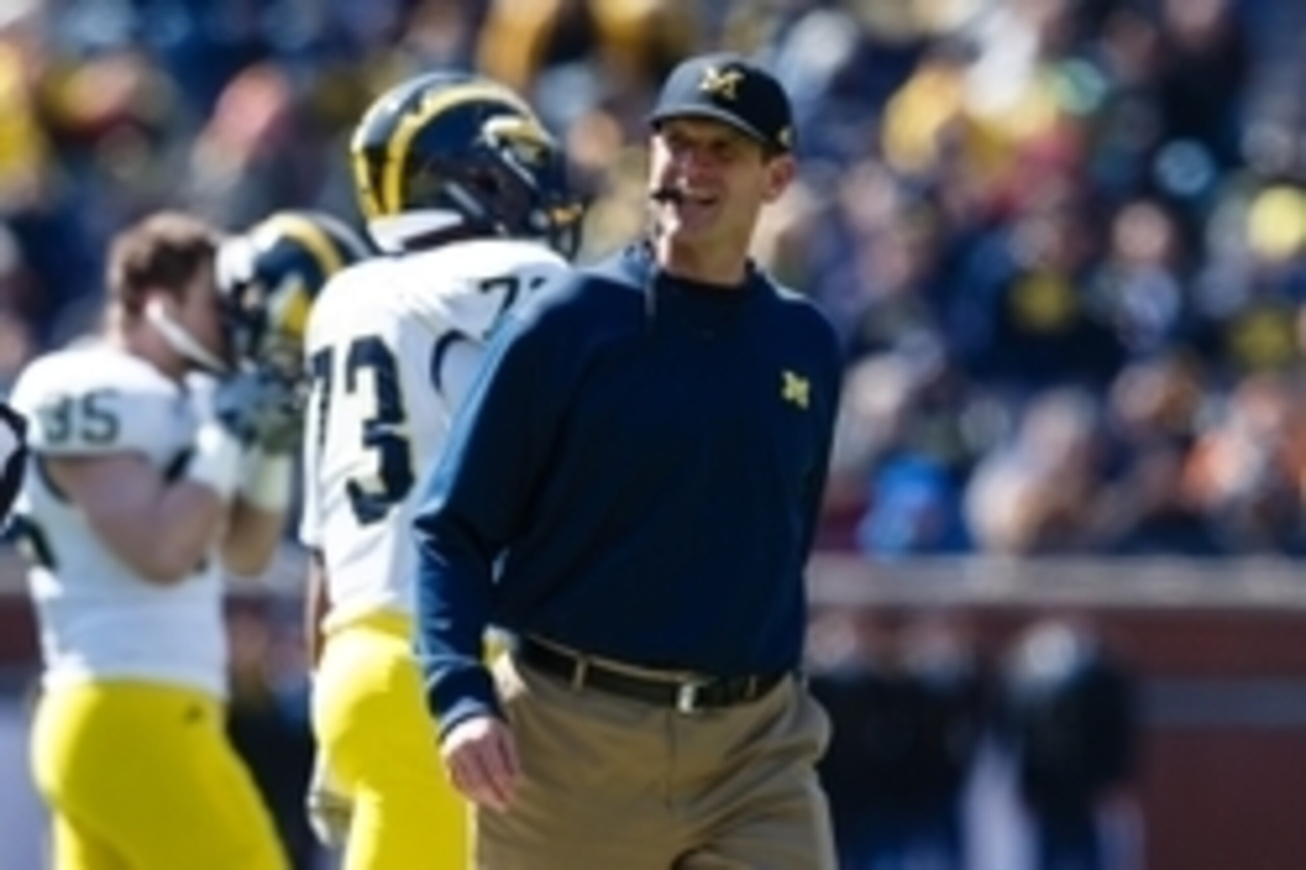 Apr 4, 2015; Ann Arbor, MI, USA; Michigan Wolverines head coach Jim Harbaugh is seen during the Spring football game at Michigan Stadium. Mandatory Credit: Rick Osentoski-USA TODAY Sports Apr 4, 2015; Ann Arbor, MI, USA; Michigan Wolverines head coach Jim Harbaugh is seen during the Spring football game at Michigan Stadium. Mandatory Credit: Rick Osentoski-USA TODAY Sports