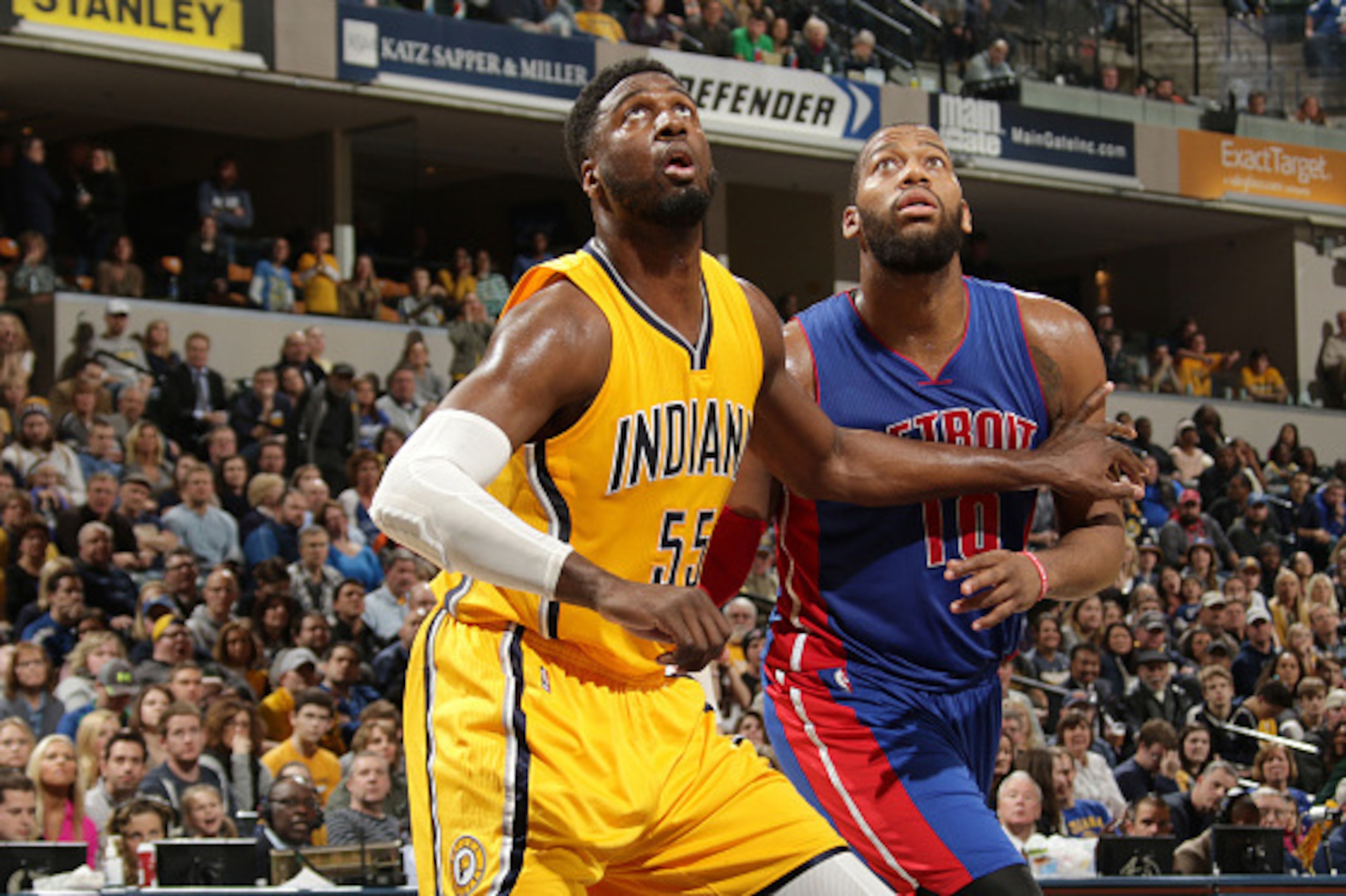 INDIANAPOLIS, IN -  JANUARY 16: Roy Hibbert #55 of the Indiana Pacers looks for the rebound against Greg Monroe #10 of the Detroit Pistons during the game on January 16, 2015 at Bankers Life Fieldhouse in Indianapolis, Indiana. NOTE TO USER: User expressl
