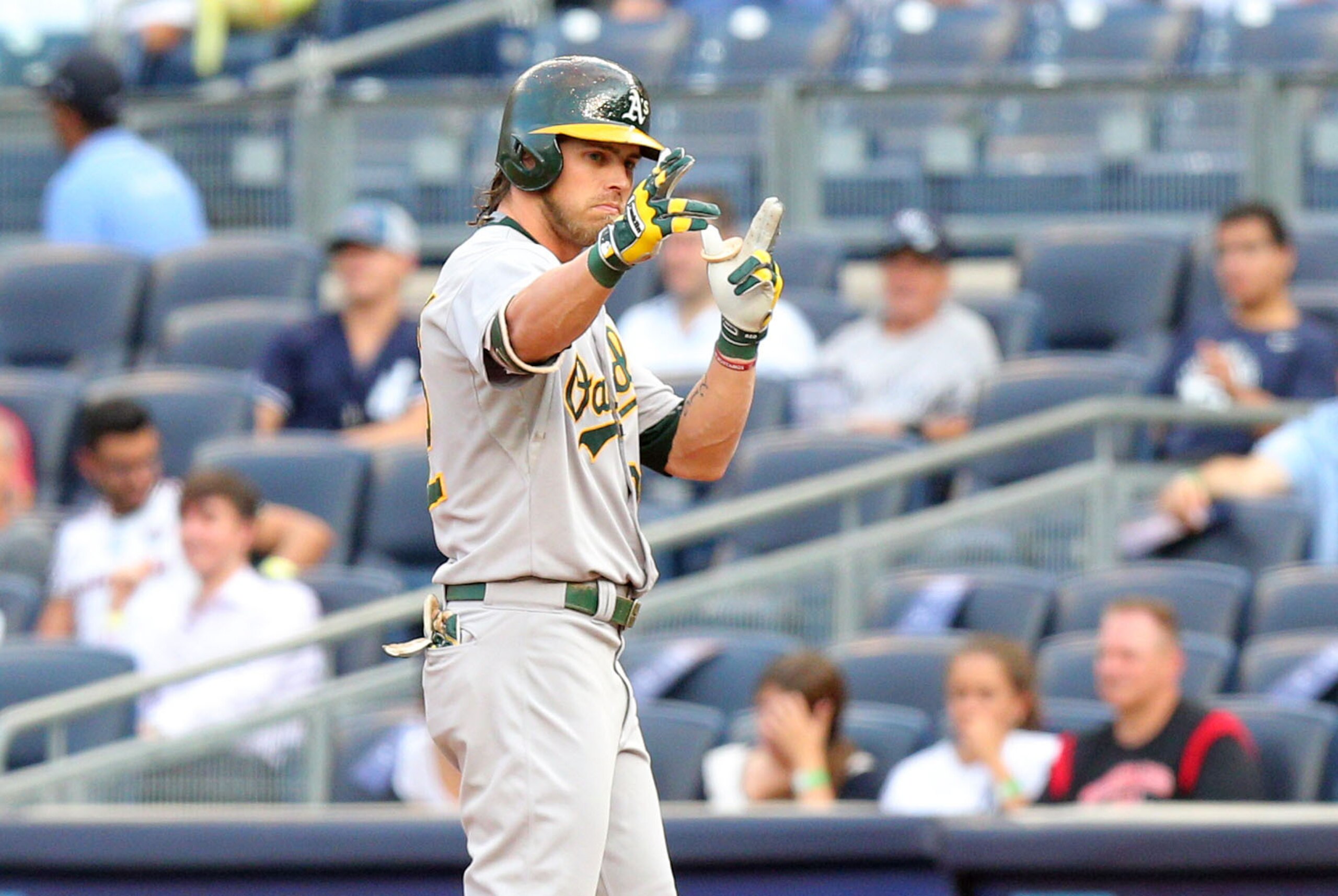 Jul 7, 2015; Bronx, NY, USA; Oakland Athletics right fielder Josh Reddick (22) reacts after hitting an RBI single against the New York Yankees during the first inning at Yankee Stadium. Mandatory Credit: Brad Penner-USA TODAY Sports Jul 7, 2015; Bronx, NY, USA; Oakland Athletics right fielder Josh Reddick (22) reacts after hitting an RBI single against the New York Yankees during the first inning at Yankee Stadium. Mandatory Credit: Brad Penner-USA TODAY Sports