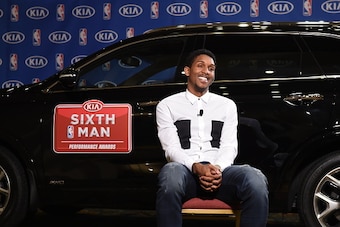 TORONTO, CANADA - April 20: Lou Williams of the Toronto Raptors Receives the Kia Sixth Man Award in Toronto, Ontario, Canada.  NOTE TO USER: User expressly acknowledges and agrees that, by downloading and or using this Photograph, user is consenting to th