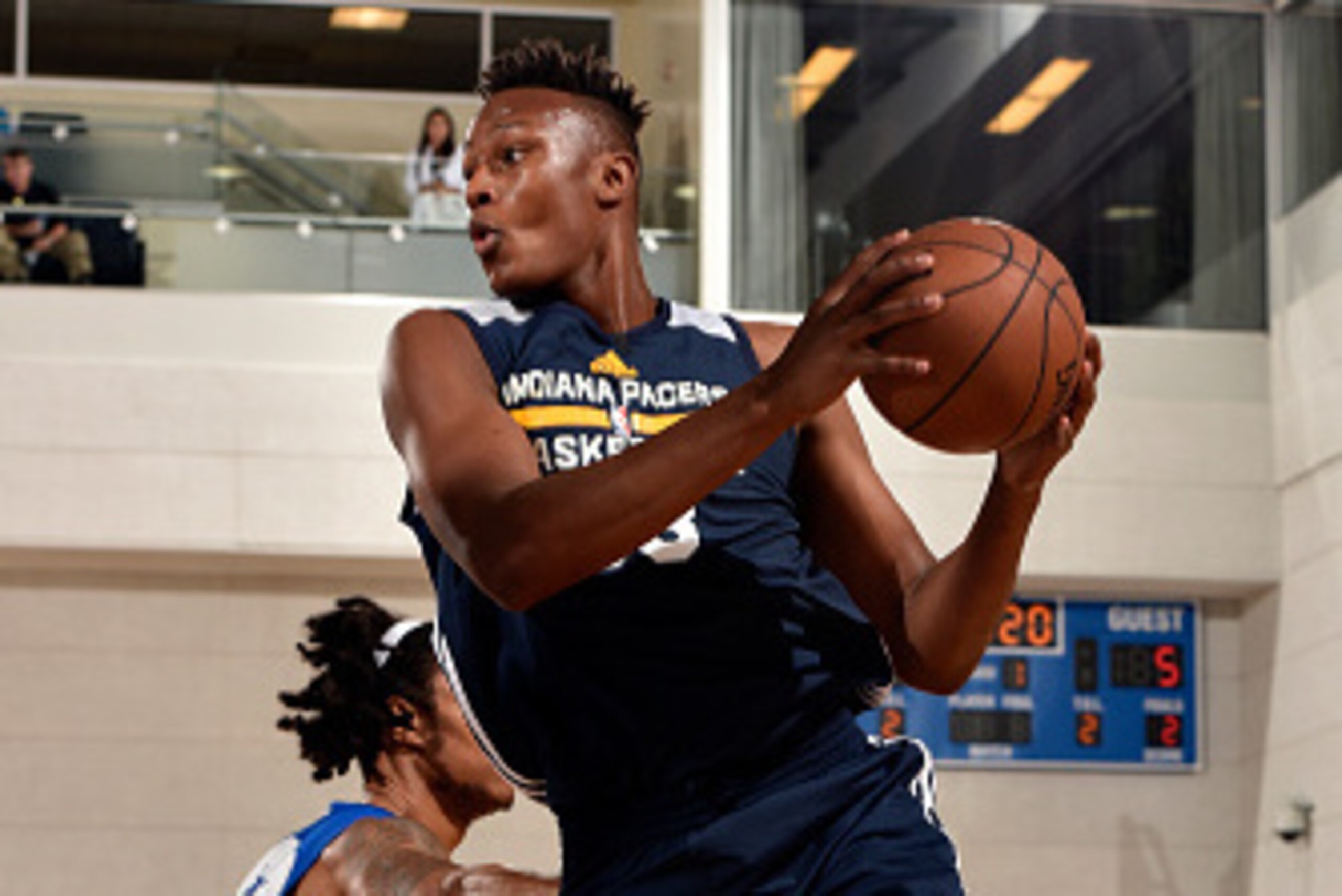 ORLANDO, FL - JULY 8: Myles Turner #33 of the Indiana Pacers grabs the rebound against the Detroit Pistons on July 8, 2015 at Amway Center in Orlando, Florida. NOTE TO USER: User expressly acknowledges and agrees that, by downloading and or using this pho