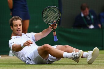 LONDON, ENGLAND - JULY 08:  Richard Gasquet of France celebrates at match point after winning his Gentlemens Singles Quarter Final match against Stanislas Wawrinka of Switzerland during day nine of the Wimbledon Lawn Tennis Championships at the All Englan
