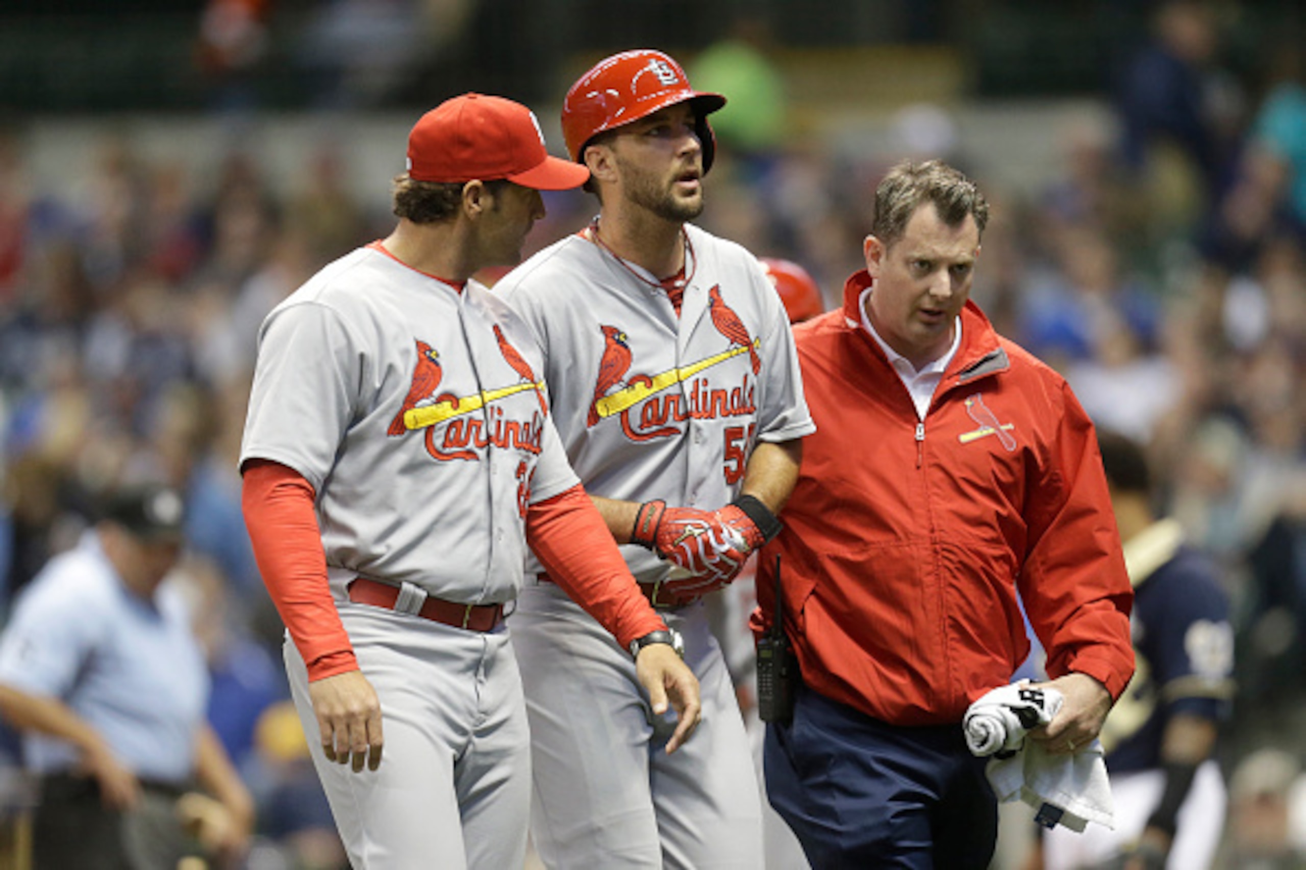 MILWAUKEE, WI - APRIL 25: Adam Wainwright #50 of the St. Louis Cardinals is helped off the field after his at bat in the fifth inning during the game against the Milwaukee Brewers at Miller Park on April 25, 2015 in Milwaukee, Wisconsin. (Photo by Mike Mc MILWAUKEE, WI - APRIL 25: Adam Wainwright #50 of the St. Louis Cardinals is helped off the field after his at bat in the fifth inning during the game against the Milwaukee Brewers at Miller Park on April 25, 2015 in Milwaukee, Wisconsin. (Photo by Mike Mc