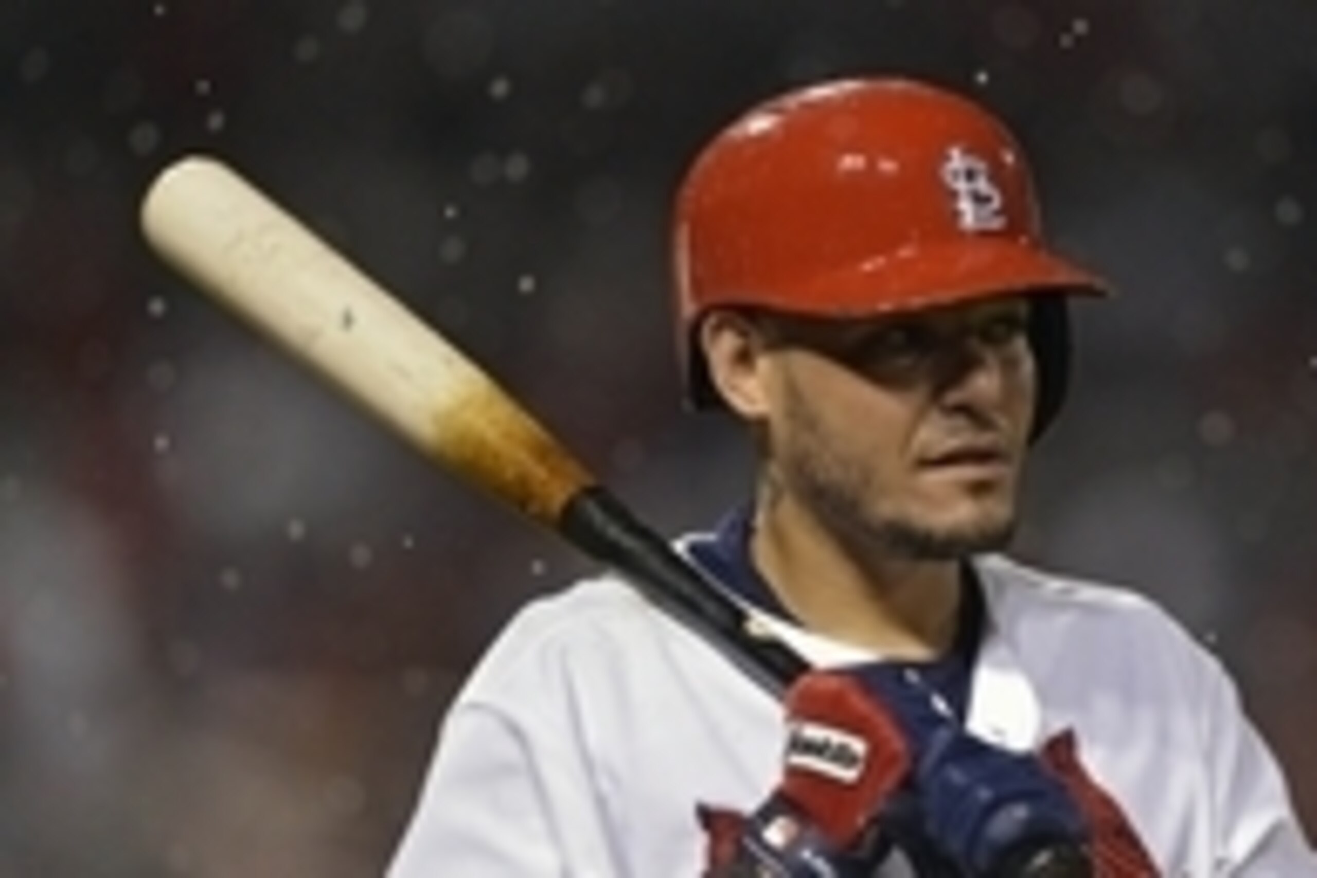 Jul 1, 2015; St. Louis, MO, USA; St. Louis Cardinals catcher Yadier Molina (4) walks off the field as the grounds crew runs out to put the tarp on the field for the third rain delay of the game during the second inning against the Chicago White Sox at Bus Jul 1, 2015; St. Louis, MO, USA; St. Louis Cardinals catcher Yadier Molina (4) walks off the field as the grounds crew runs out to put the tarp on the field for the third rain delay of the game during the second inning against the Chicago White Sox at Bus
