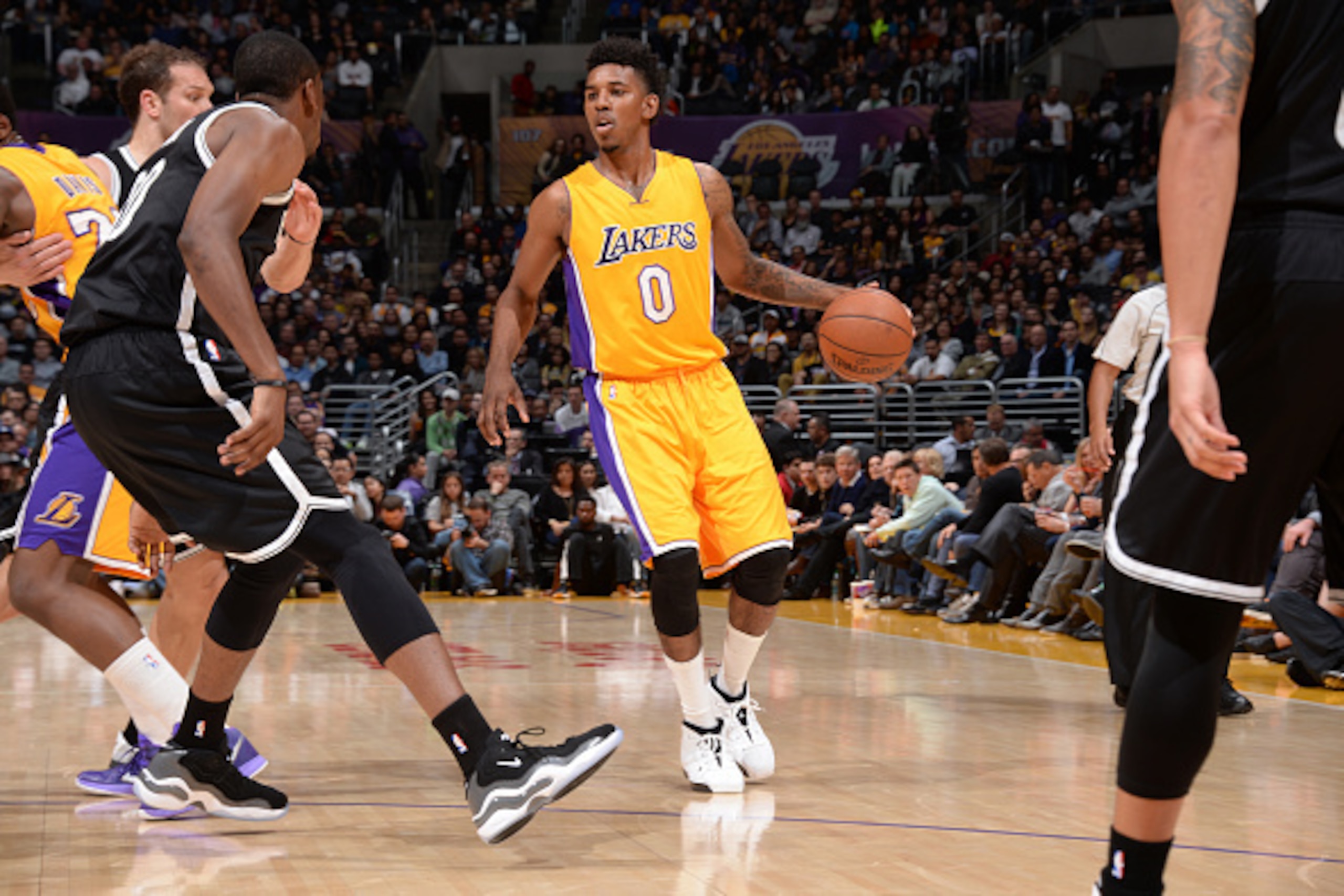 LOS ANGELES, CA - FEBRUARY 20: Nick Young #0 of the Los Angeles Lakers drives to the basket against the Brooklyn Nets during the game on February 20, 2015 at STAPLES Center in Los Angeles, California. NOTE TO USER: User expressly acknowledges and agrees t LOS ANGELES, CA - FEBRUARY 20: Nick Young #0 of the Los Angeles Lakers drives to the basket against the Brooklyn Nets during the game on February 20, 2015 at STAPLES Center in Los Angeles, California. NOTE TO USER: User expressly acknowledges and agrees t