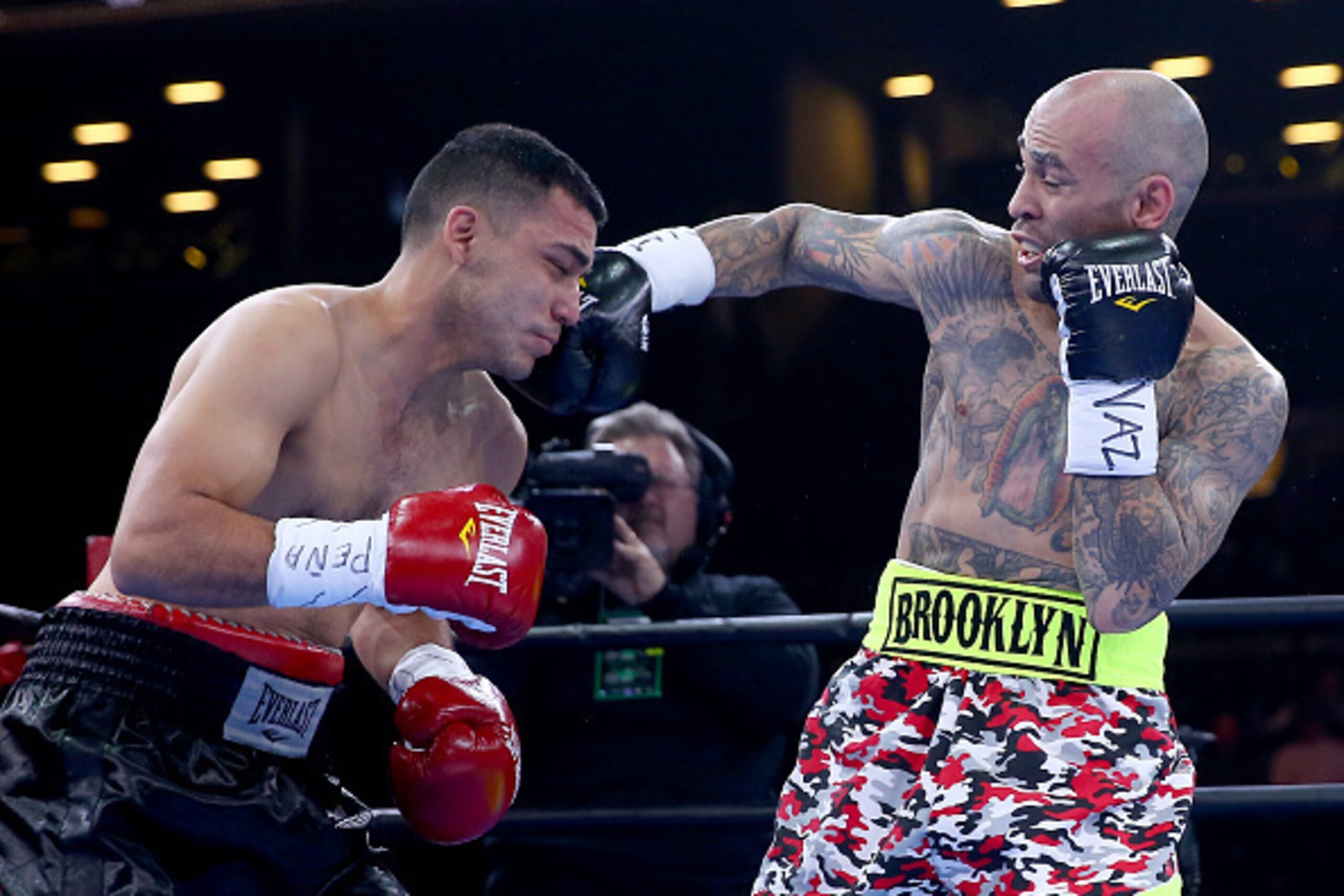 NEW YORK, NY - APRIL 11: Luis Collazo and Chris Degollado exchange punches during the Premier Boxing Champions Welterweight bout at Barclays Center on April 11, 2015 in the Brooklyn borough of New York City. (Photo by Elsa/Getty Images) NEW YORK, NY - APRIL 11: Luis Collazo and Chris Degollado exchange punches during the Premier Boxing Champions Welterweight bout at Barclays Center on April 11, 2015 in the Brooklyn borough of New York City. (Photo by Elsa/Getty Images)