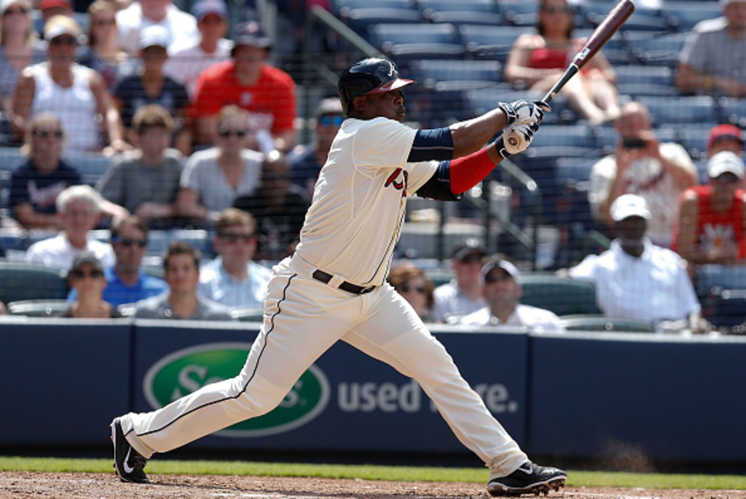 ATLANTA, GA - JULY 05:  Pinch hitter Juan Uribe #2 of the Atlanta Braves strikes out in the bottom of the ninth inning during the game against the Philadelphia Phillies at Turner Field on July 5, 2015 in Atlanta, Georgia.  (Photo by Mike Zarrilli/Getty Im