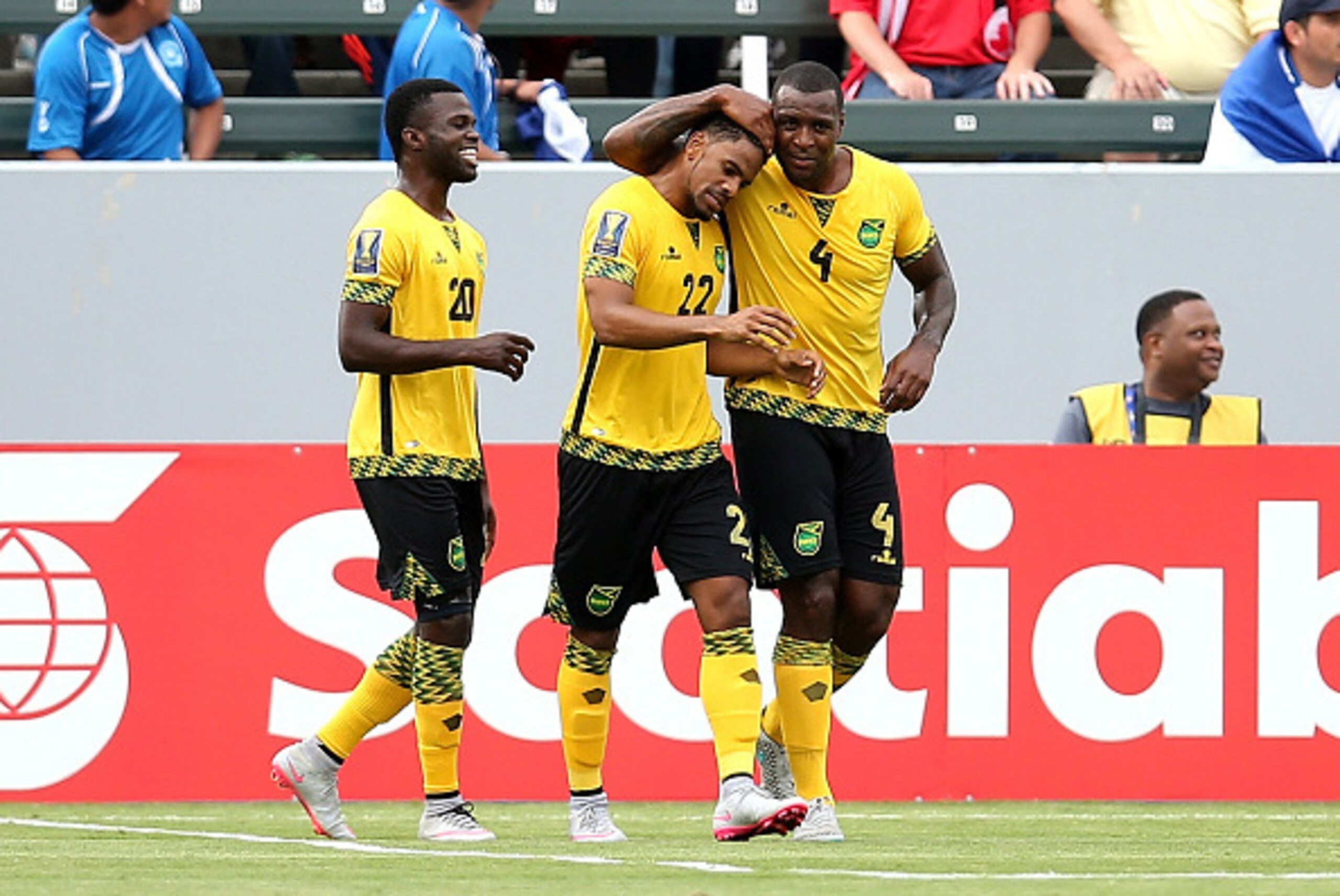 LOS ANGELES, CA - JULY 08:  Jermaine Taylor #22 of Jamaica celebrates with Westley Morgan #4 and Kemar Lawrence #20 after his first half goal against Costa Rica in their CONCACAF Gold Cup Group B match at StubHub Center on July 8, 2015 in Los Angeles, Cal