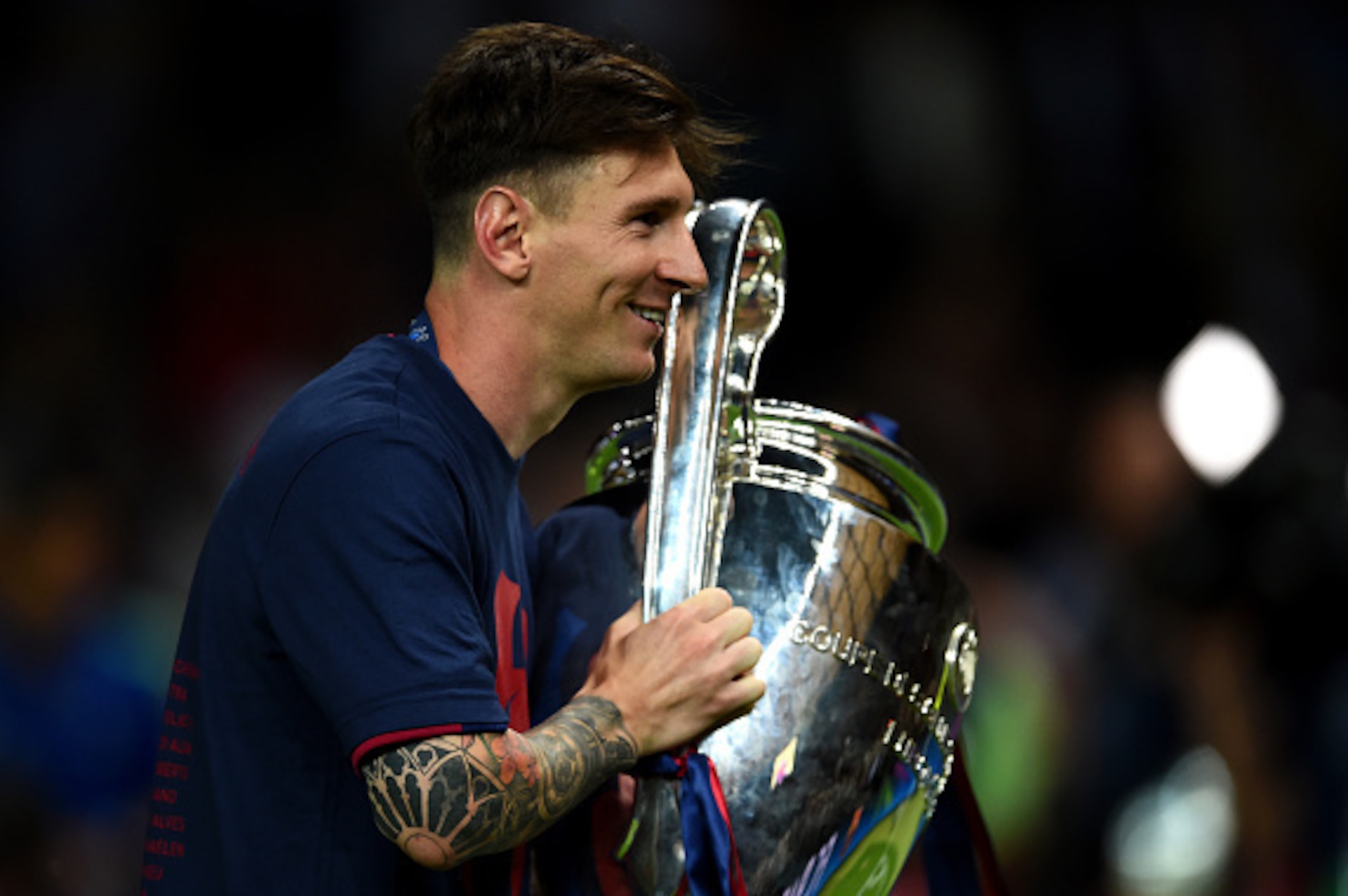 BERLIN, GERMANY - JUNE 06: Lionel Messi of Barcelona celebrates with the trophy after the UEFA Champions League Final between Juventus and FC Barcelona at Olympiastadion on June 6, 2015 in Berlin, Germany. (Photo by Laurence Griffiths/Getty Images) BERLIN, GERMANY - JUNE 06: Lionel Messi of Barcelona celebrates with the trophy after the UEFA Champions League Final between Juventus and FC Barcelona at Olympiastadion on June 6, 2015 in Berlin, Germany. (Photo by Laurence Griffiths/Getty Images)